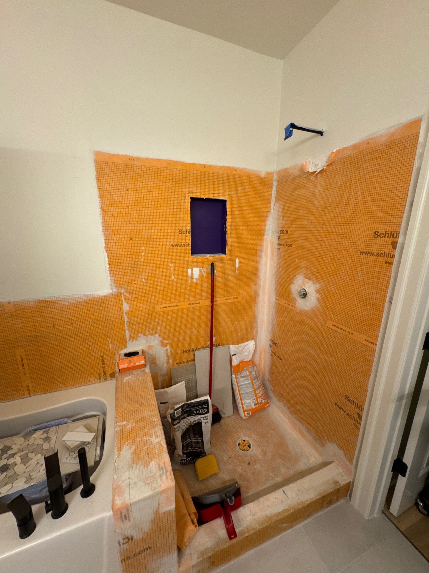 Shower and tub tiling  by Prudencio