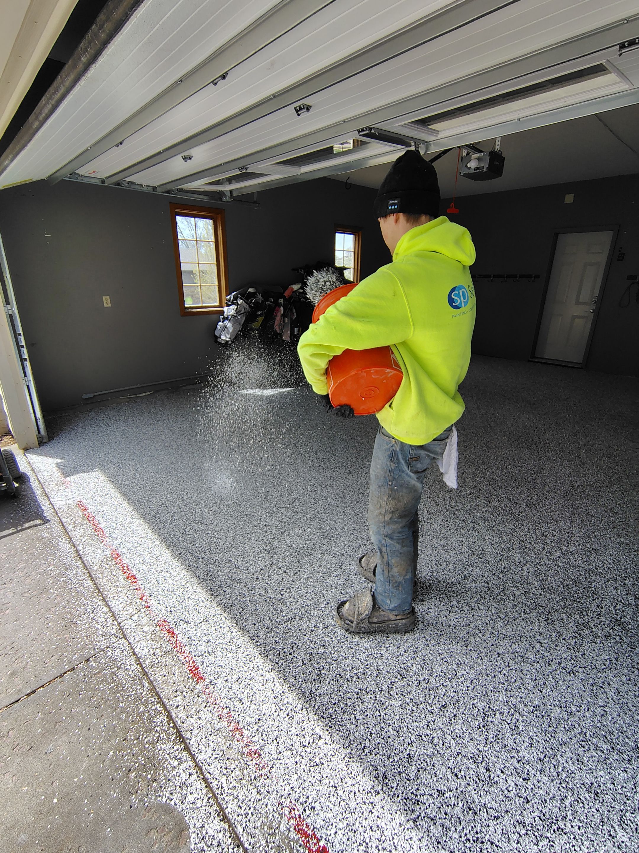 Garage Floor Concrete Coating and Crack Repair in Sioux Falls by Select Painting, Coatings & Garage Cabinets