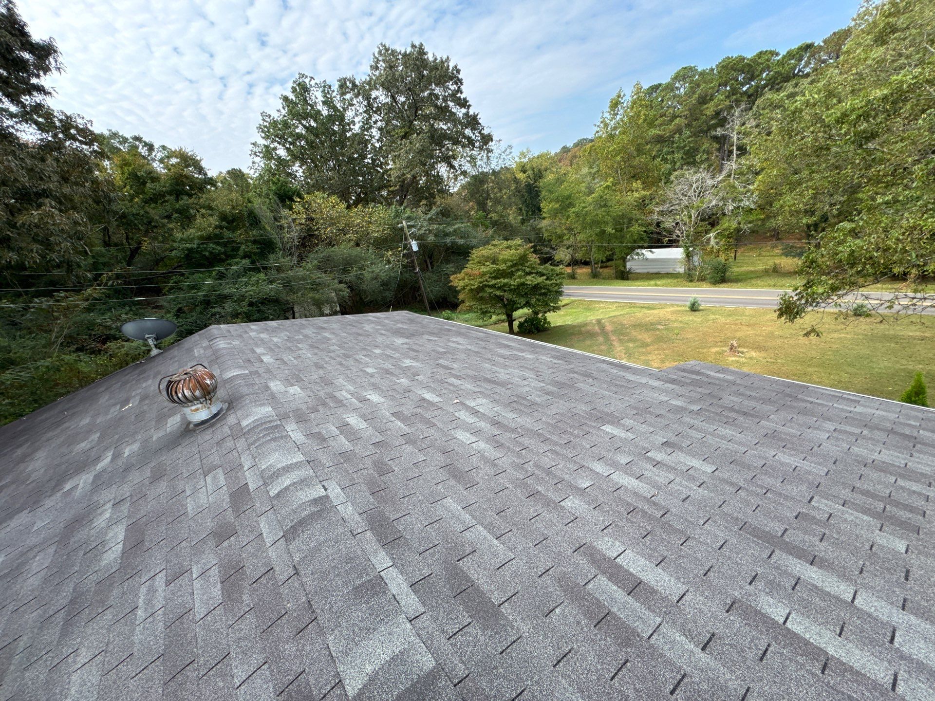Roof Replacement in Pinson (Metal Roof) by The Roofing Dudes