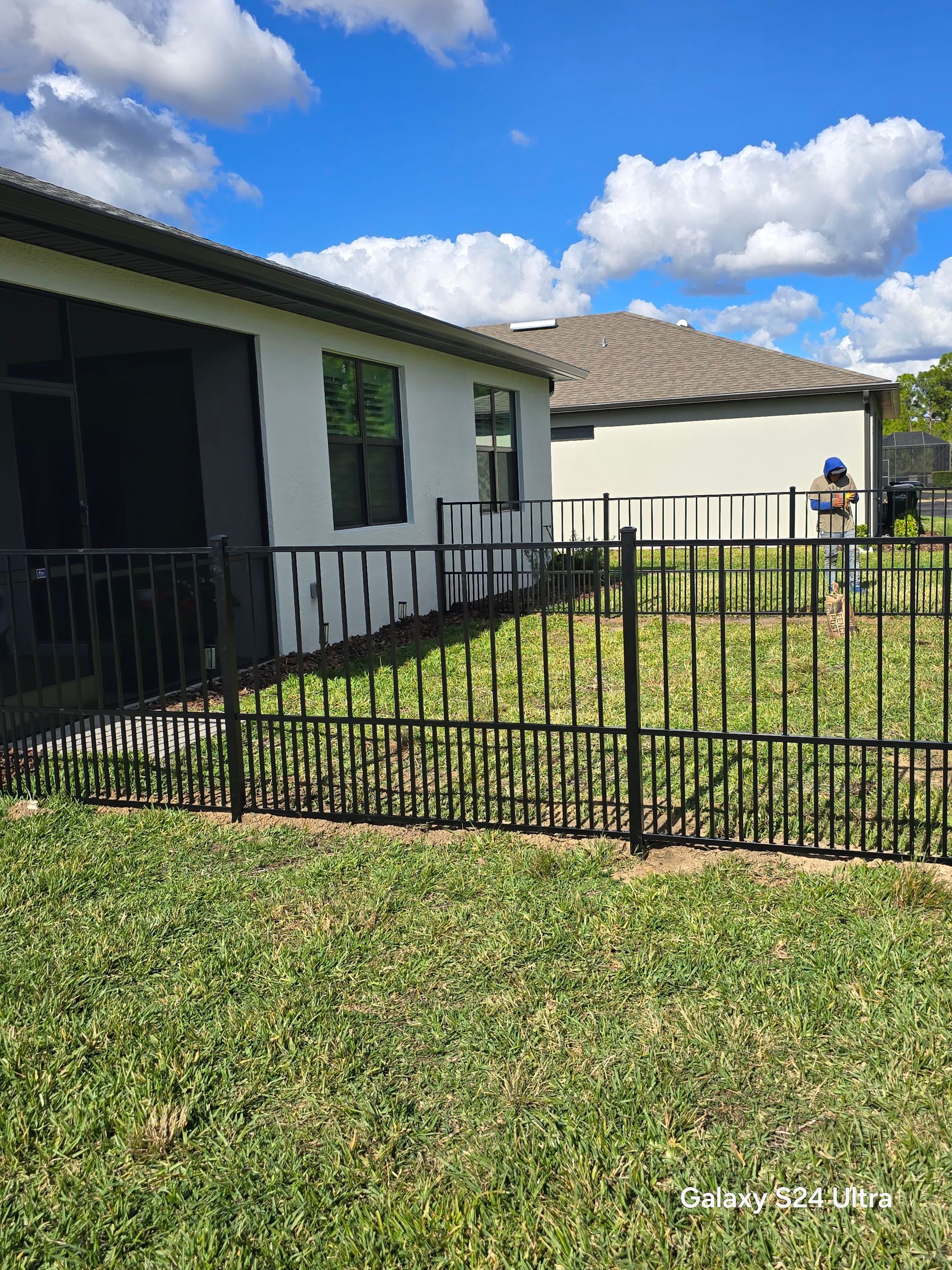 Puppy picket aluminum fence in North Port by True Fence LLC