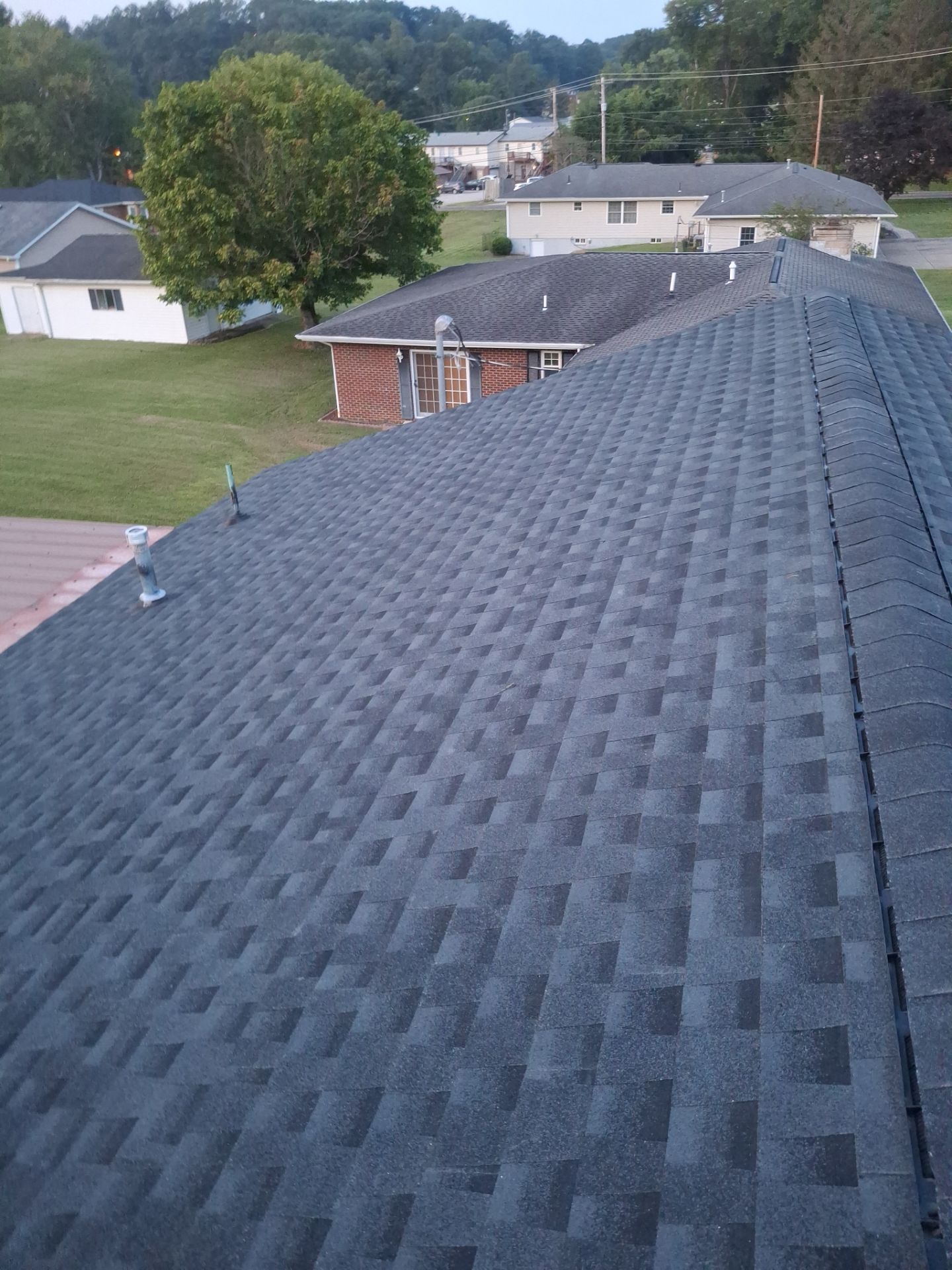 Residential Roofing Installation using GAF Timberline HDZ Charcoal by Rainstoppers Roofing