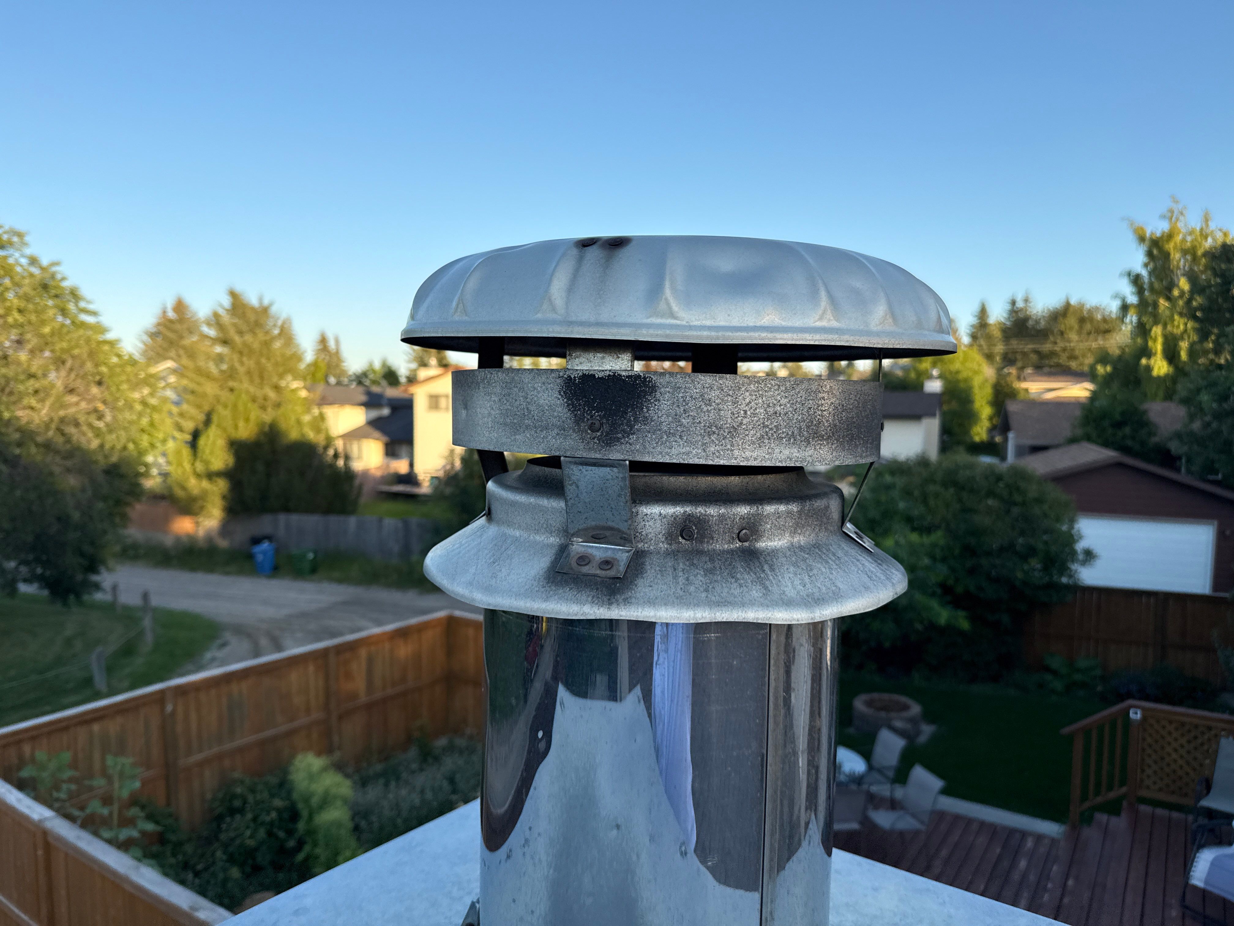 Calgary Chimney Chase Reconstruction and Exterior Siding Replacement by Smart Home Building Systems Ltd.