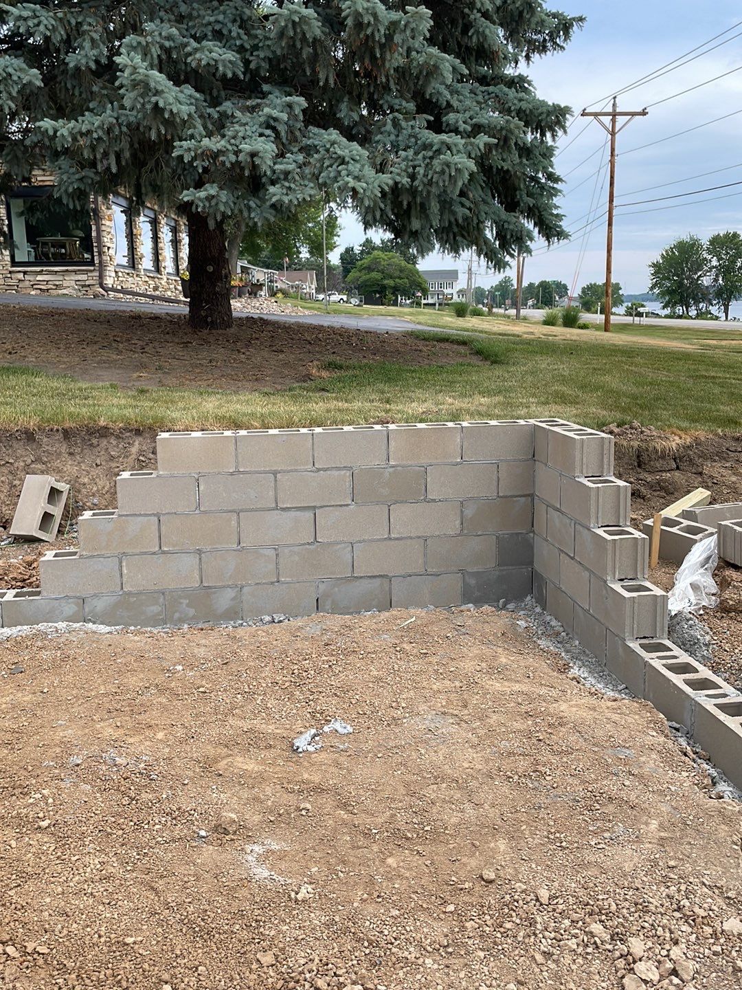 Fence / Retaining Wall using Block then parge by ACE Waterproofing & Basement Solutions