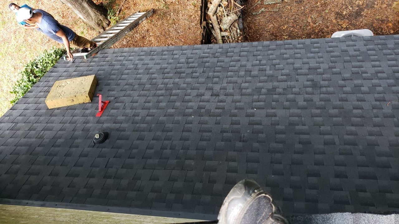 Residential Roofing Installation using Roof Replacement by American Roofing & Construction LLC