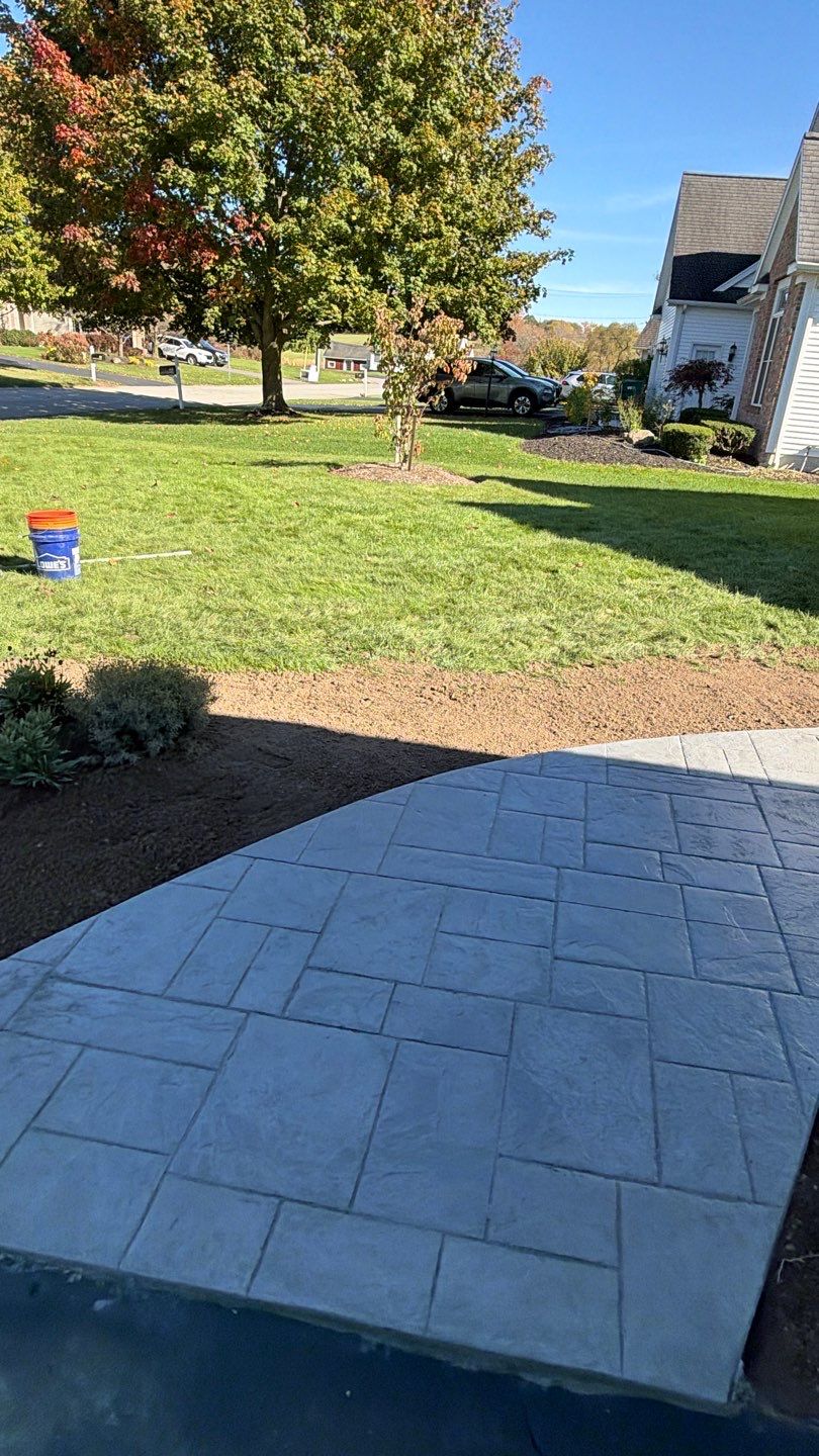 Ashler Slate Stamped Patio by NG Masonry & Construction LLC