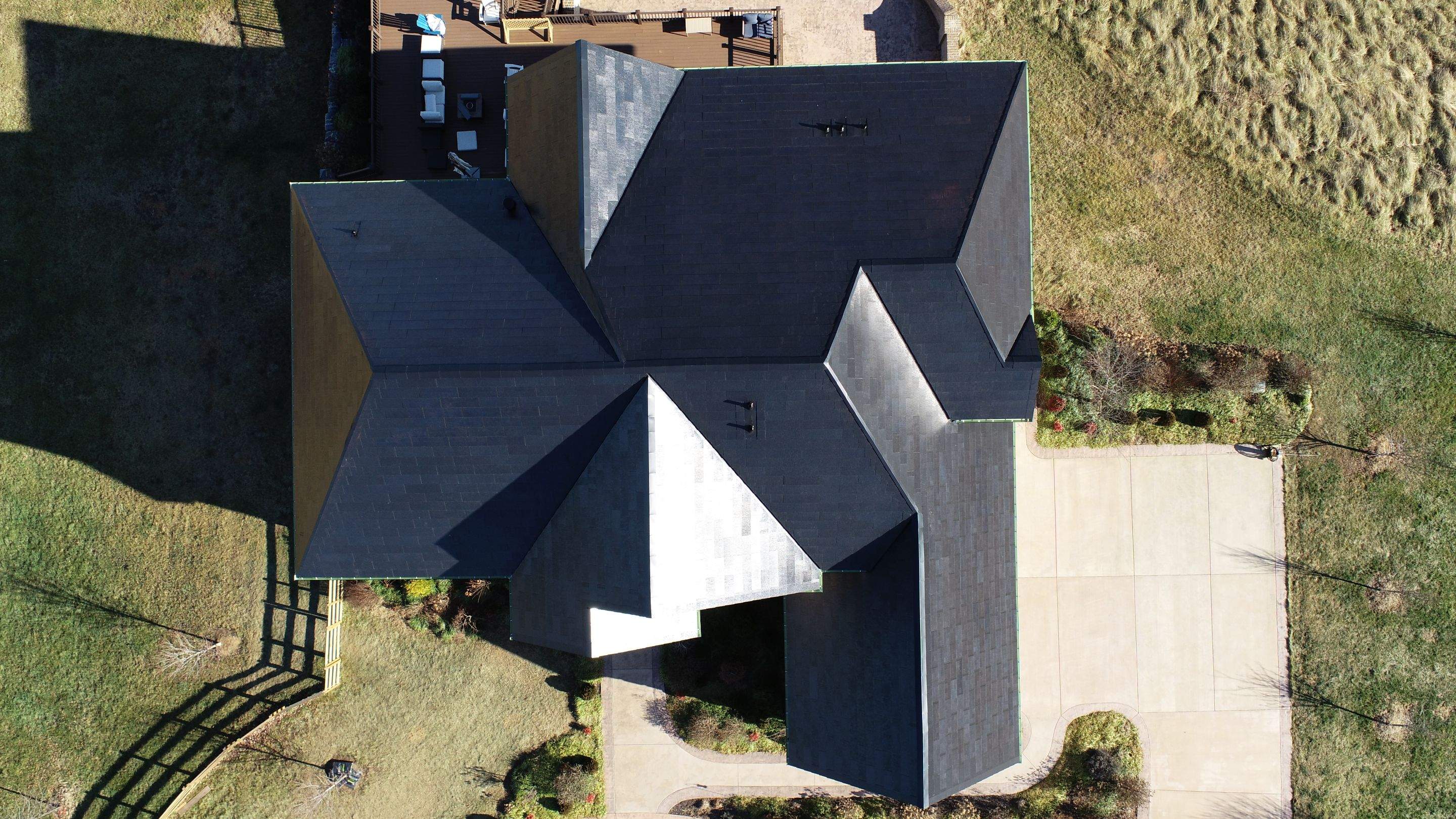 Tesla Solar Roof Replacement by American Home Contractors