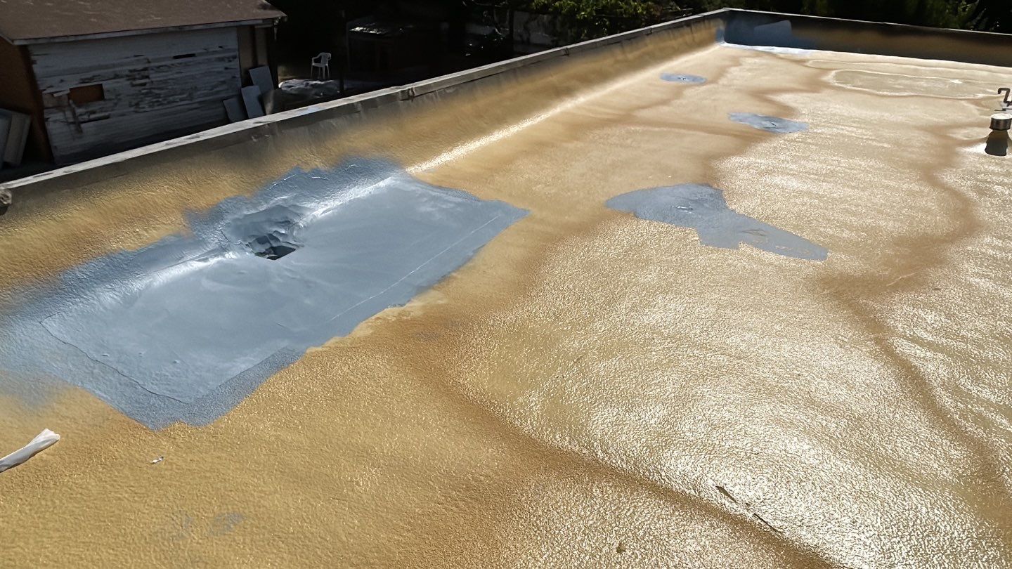 Foam Refurbish using Conklin Benchmark/PUMA XL coatings and spray foam; Also metal roofing around parapet wall by Straight Edge Roofing Inc