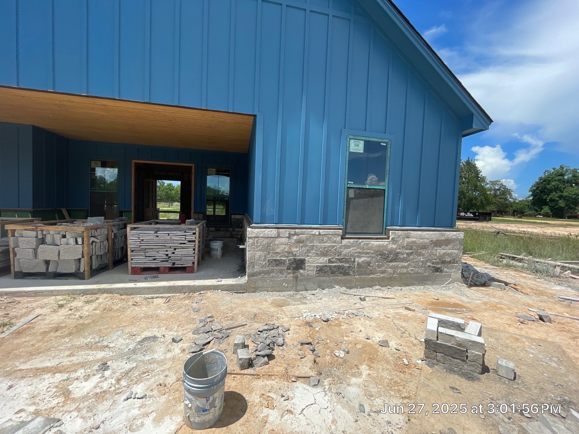 Natural Stone Elegance: Apex Installation Accented by Blue Siding by Apex Conventional Stucco Llc