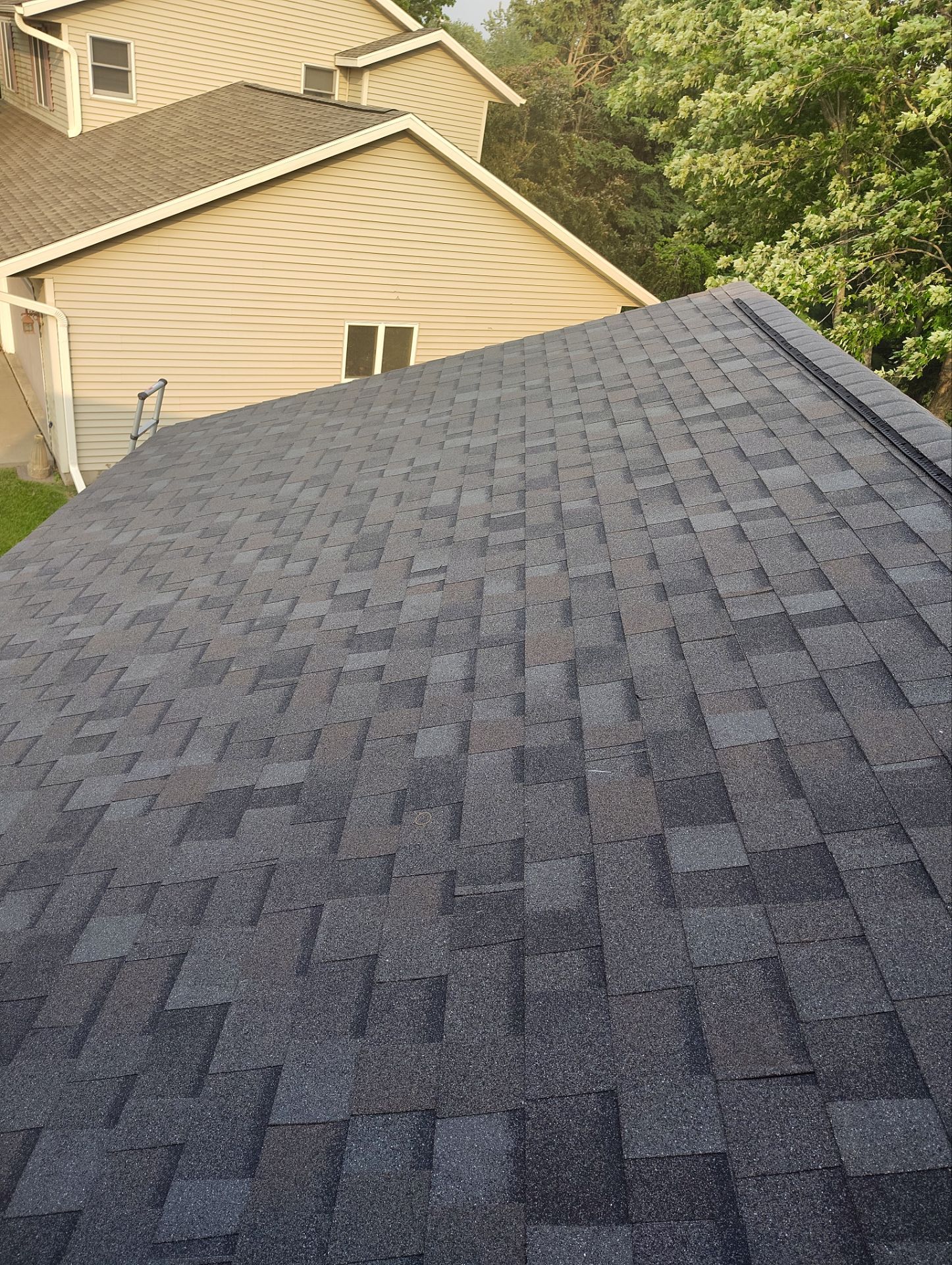 H.F.: Roofing and siding by AFC Exteriors