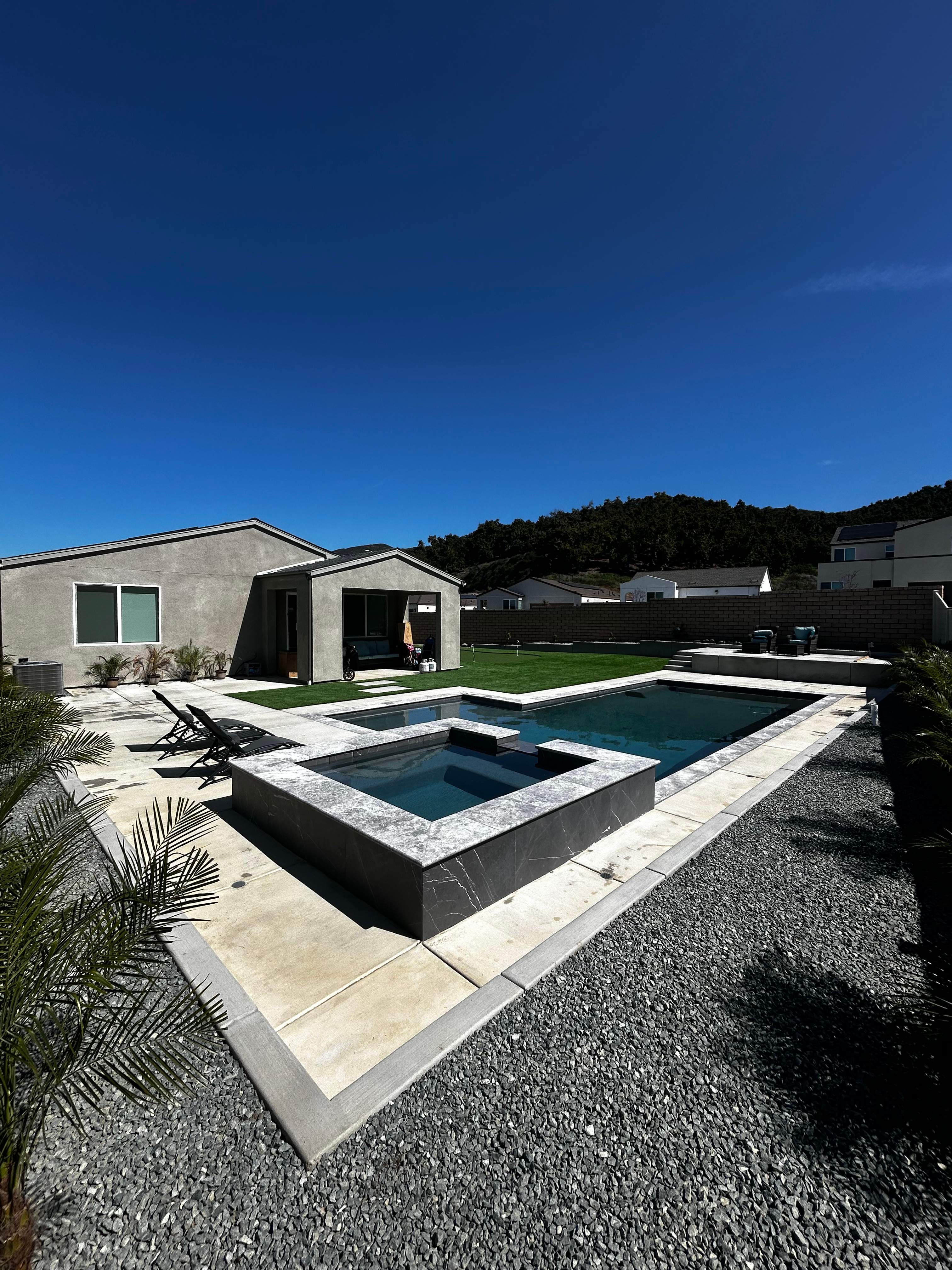 Pool and spa by Premier Pools and Spas Temecula
