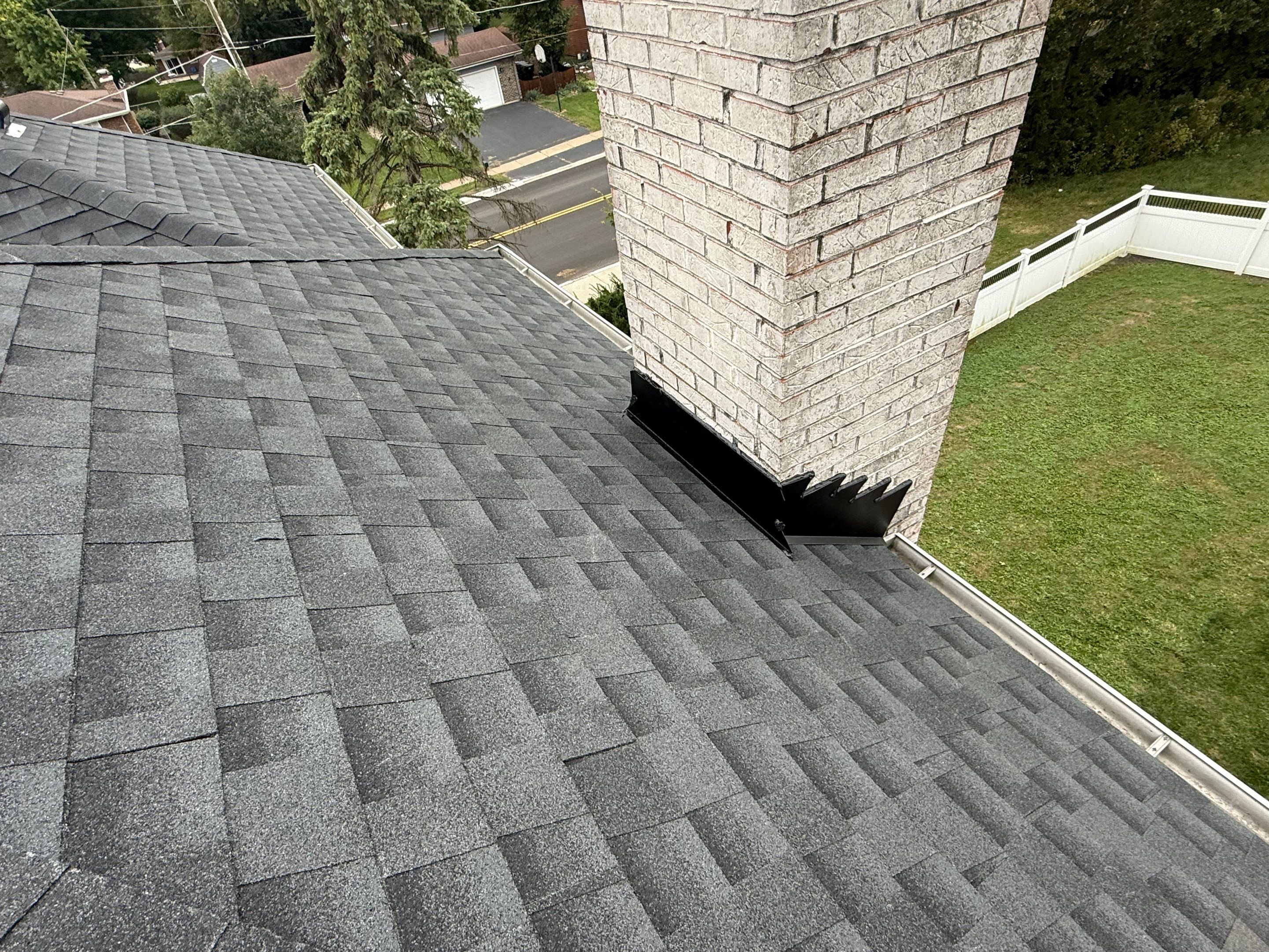 Roof and windows by Optimal Home Improvement 