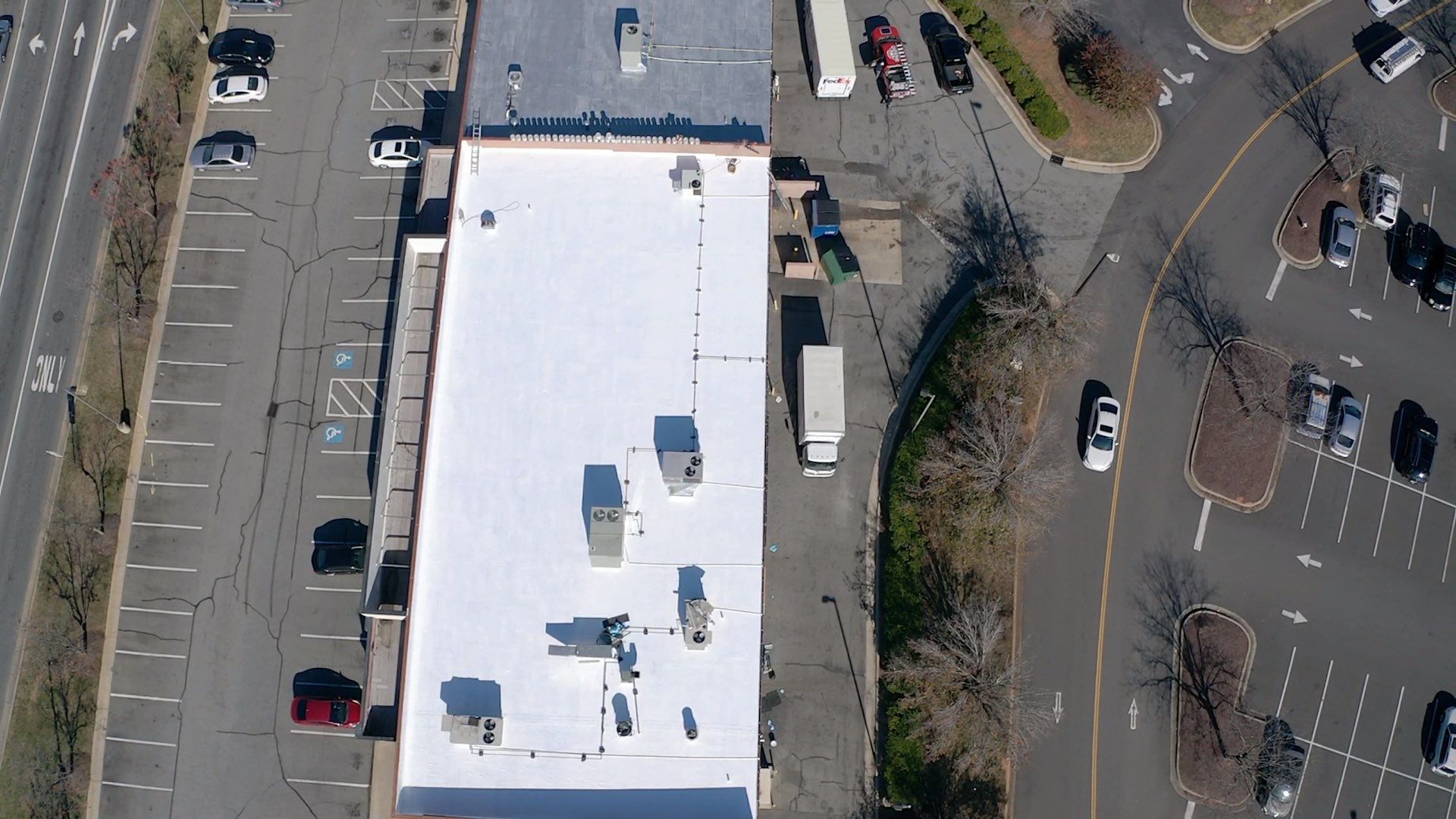 Commercial Coating using Poly Urerthane and Silicone Coating by Just In Time Roofing and Restoration
