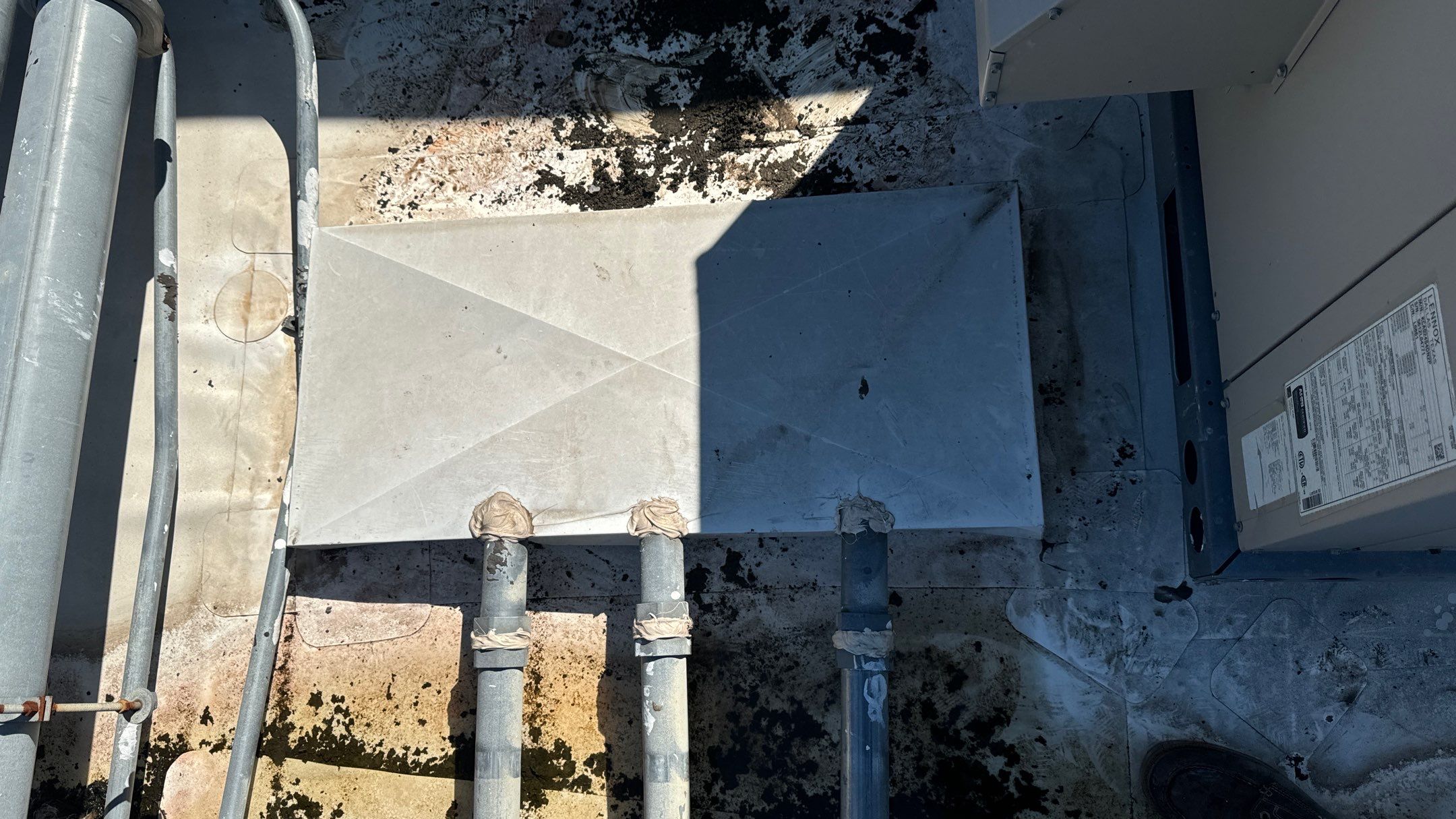 Commercial Roofing Repair using TRP #924 Eterna-Sil Premium Silicone Roof Coating by Harvey Roofing & Construction