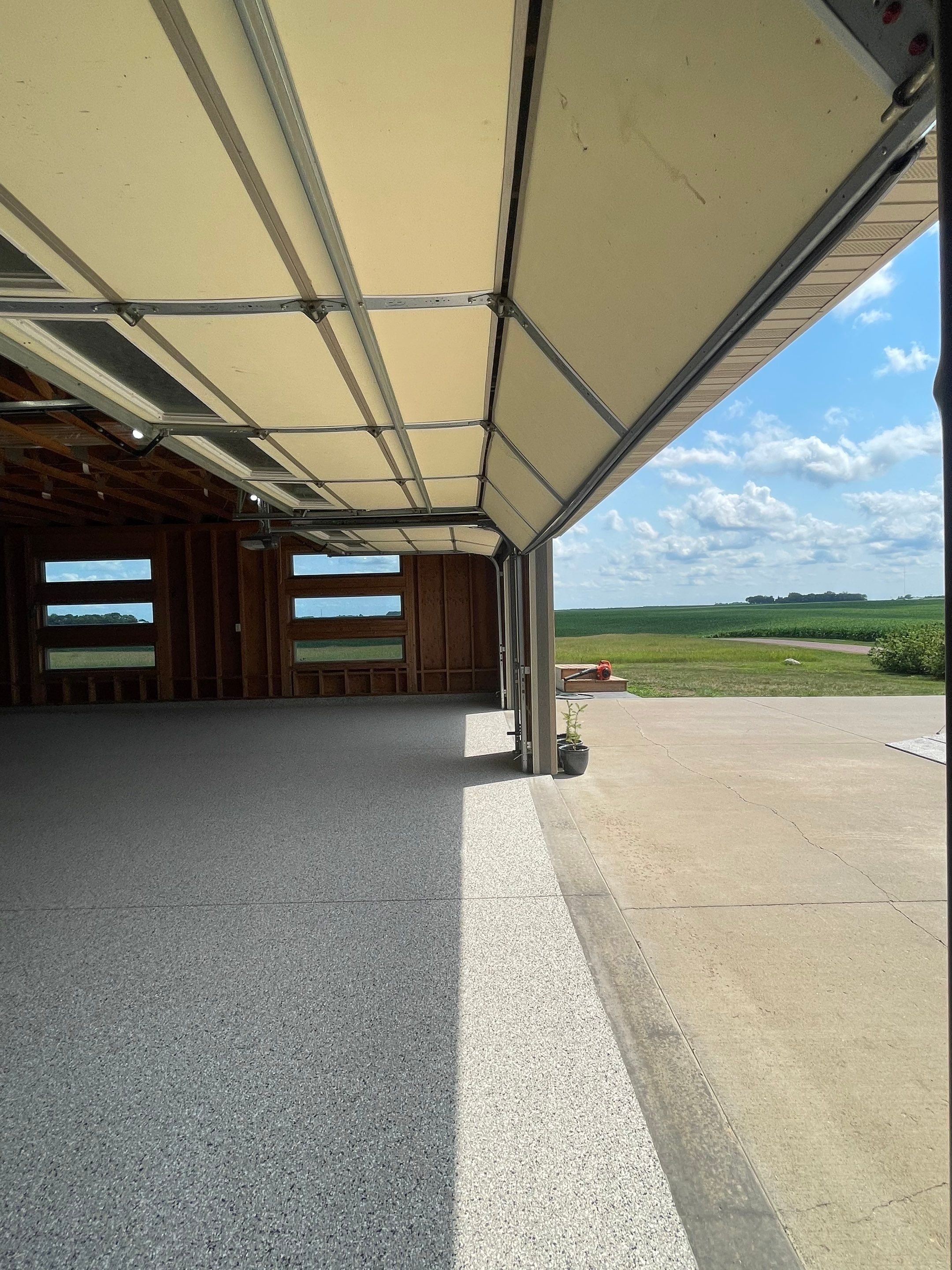 Cabin Fever Coating for Detached Garage in Dell Rapids by Select Painting, Coatings & Garage Cabinets