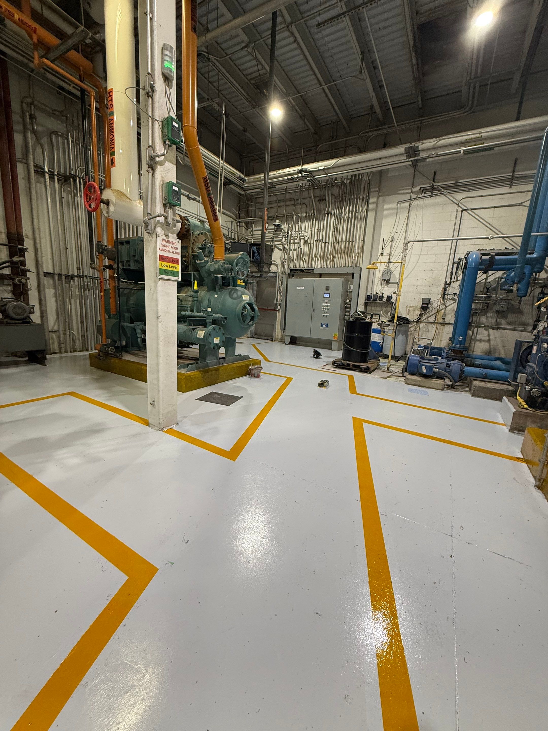 Industrial Epoxy Floor Coating for Perdue Premium Meat Co in Sioux Center by Select Painting, Coatings & Garage Cabinets