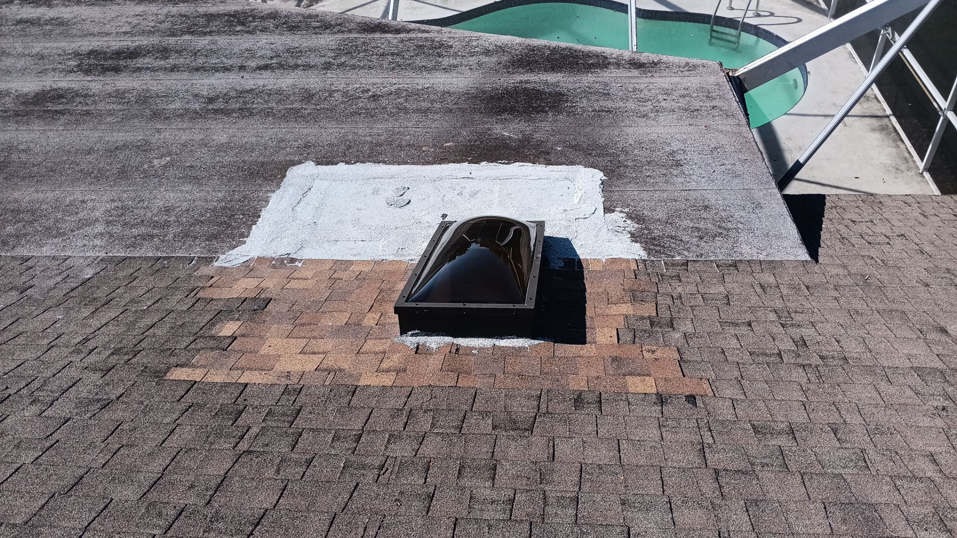 REPLACE NON APPROVED SKYLIGHT ALONG WITH CLOGED GUTTER by Morton Roofing, Inc.