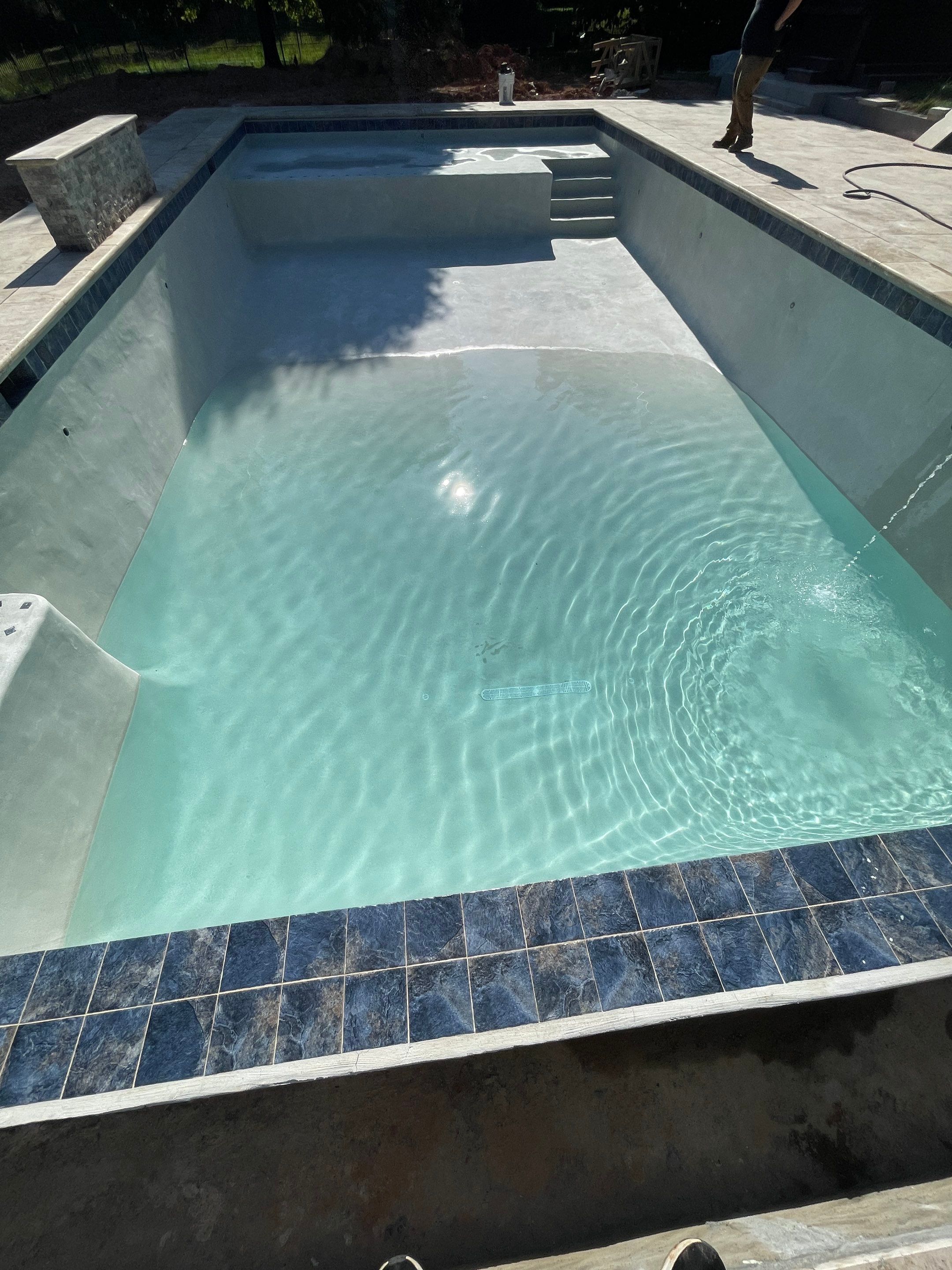 Gunite Pool w/ Raised Waterfall and Autocover  by Elysium Pools