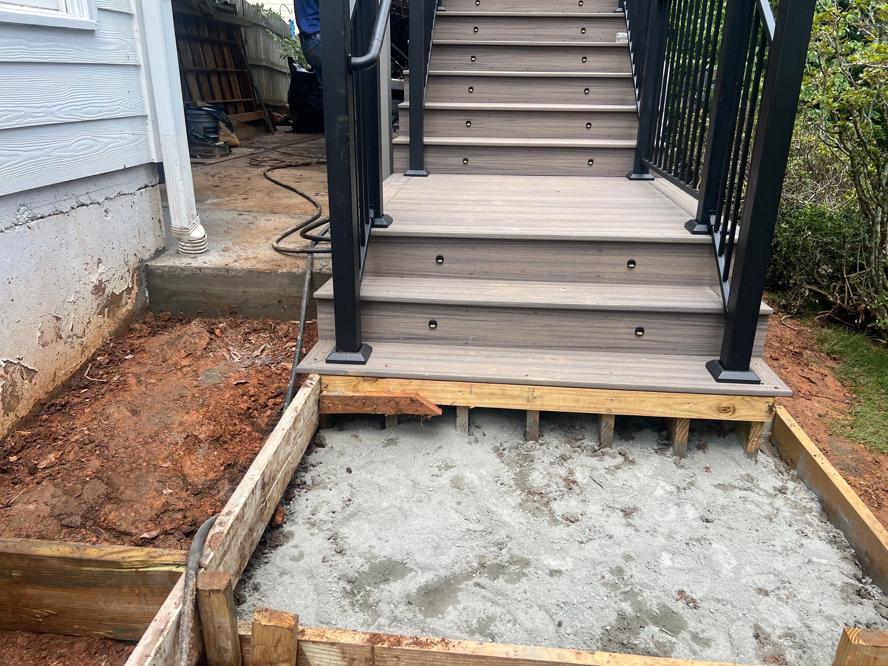 Elevated Composite Deck and Concrete Landing Installation in Kennesaw by Swift Home Renovations
