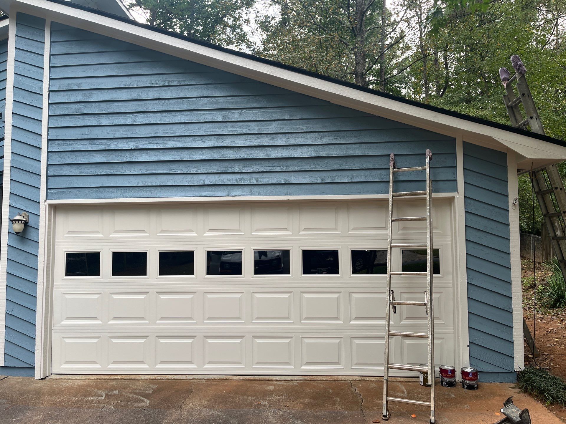 Rotten Wood Replacement, Exterior Painting, and Deck Resurface by Nelson Exteriors 