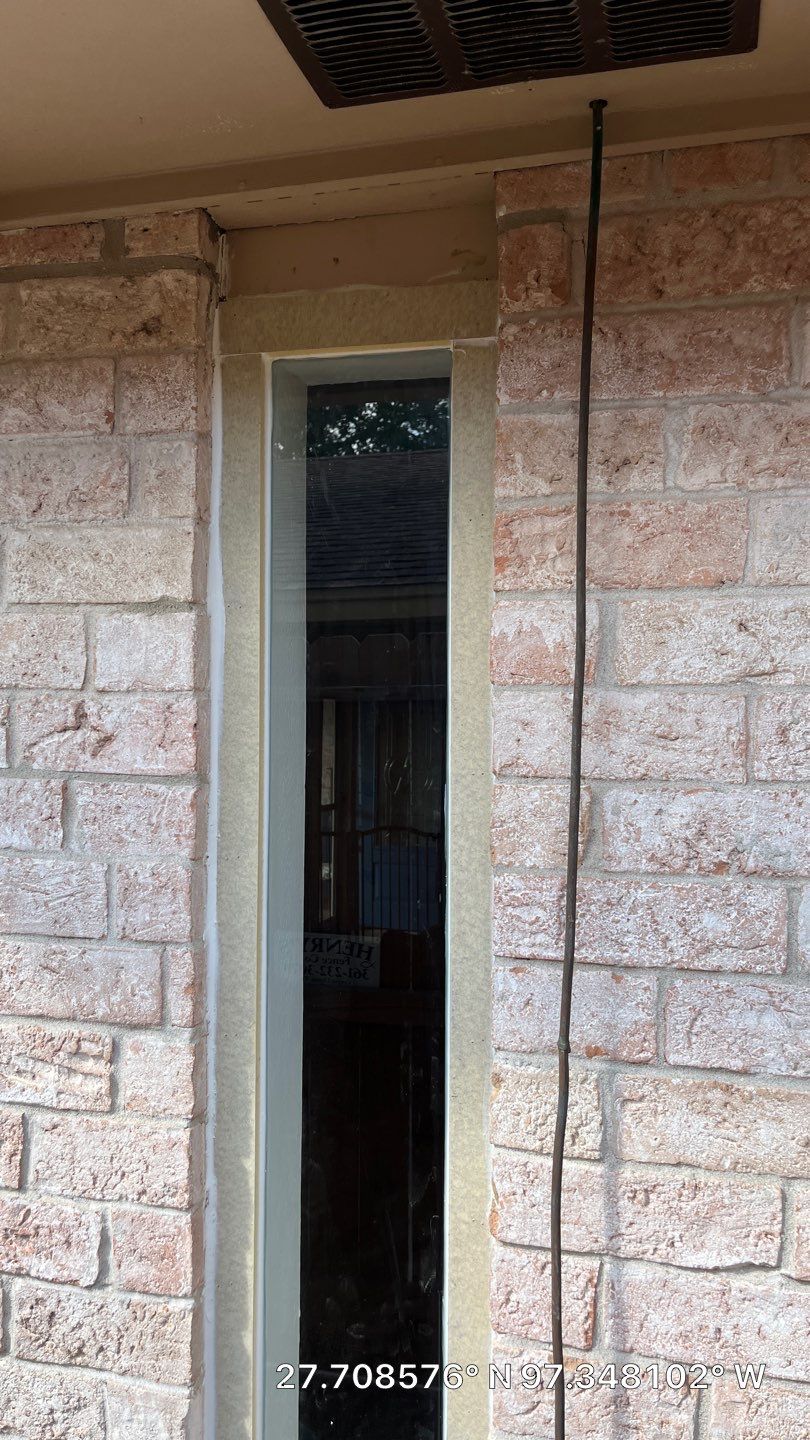 Colored Vinyl Windows to blend into brick by Bayfront Roofing and Construction