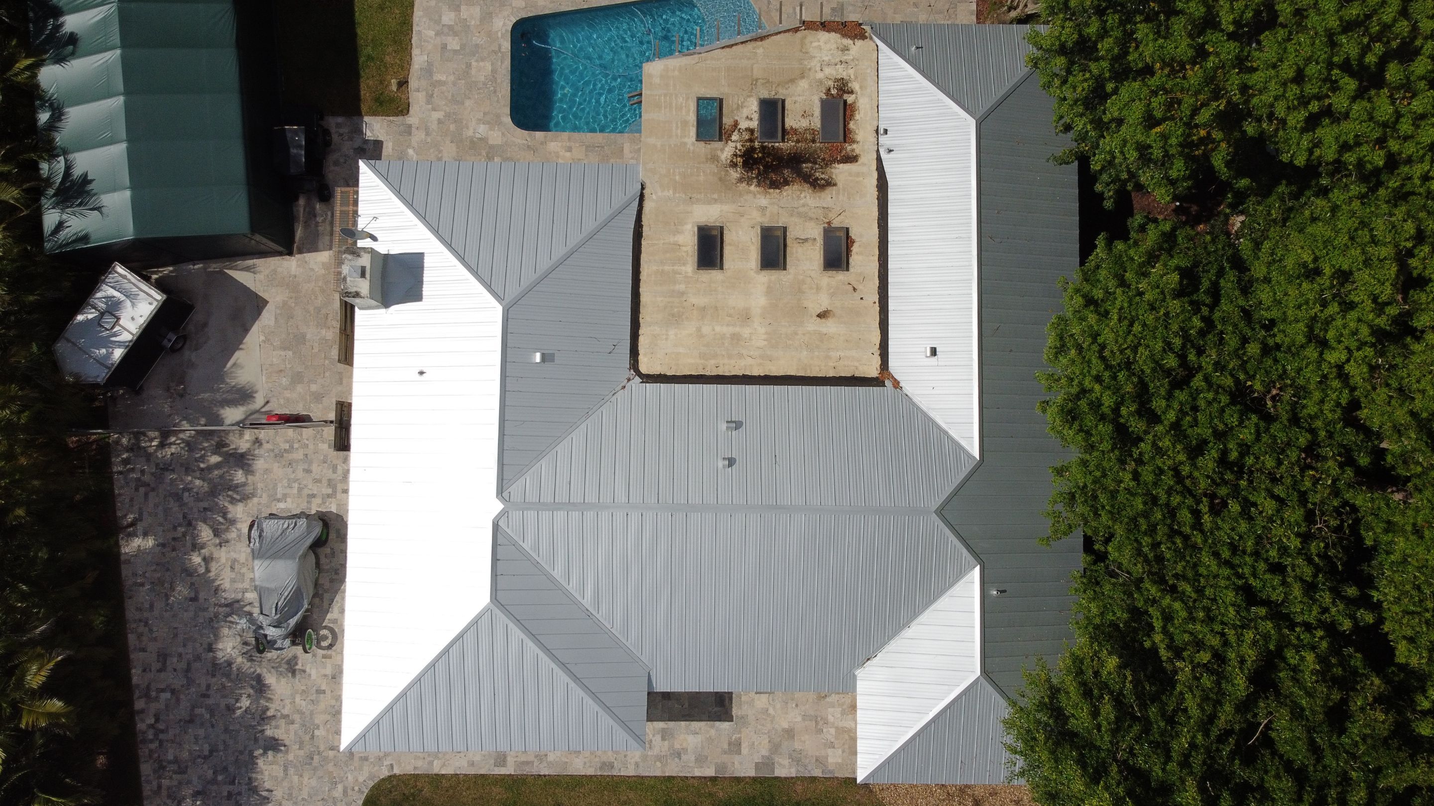 Residential Roofing Installation using 1" Nail strip metal roof by BLUES BROTHERS CONSTRUCTION CORP