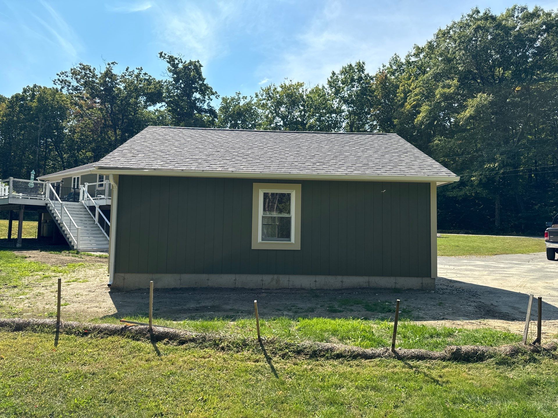 Two-Car Garage using LP SmartSide Panel Siding by Chagnon Building & Remodeling LLC