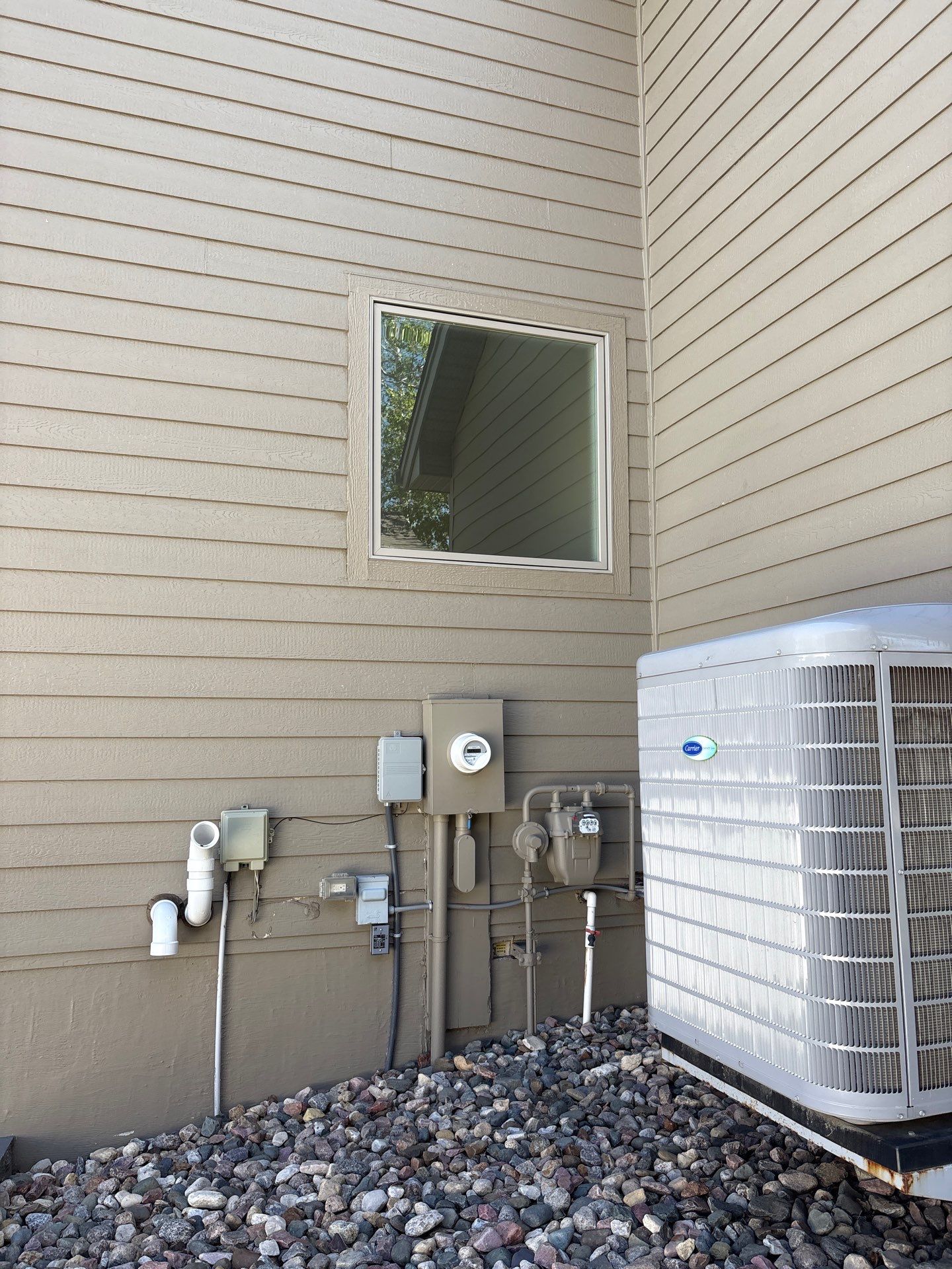 Residential Exterior Painting and Siding Refresh in Sioux Falls by Select Painting, Coatings & Garage Cabinets