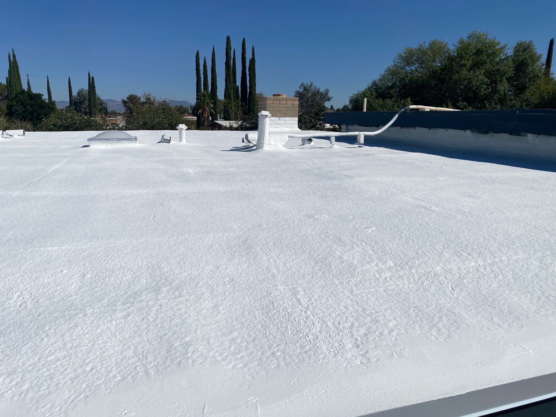Spray Polyurethane Foam by Reimagine Roofing