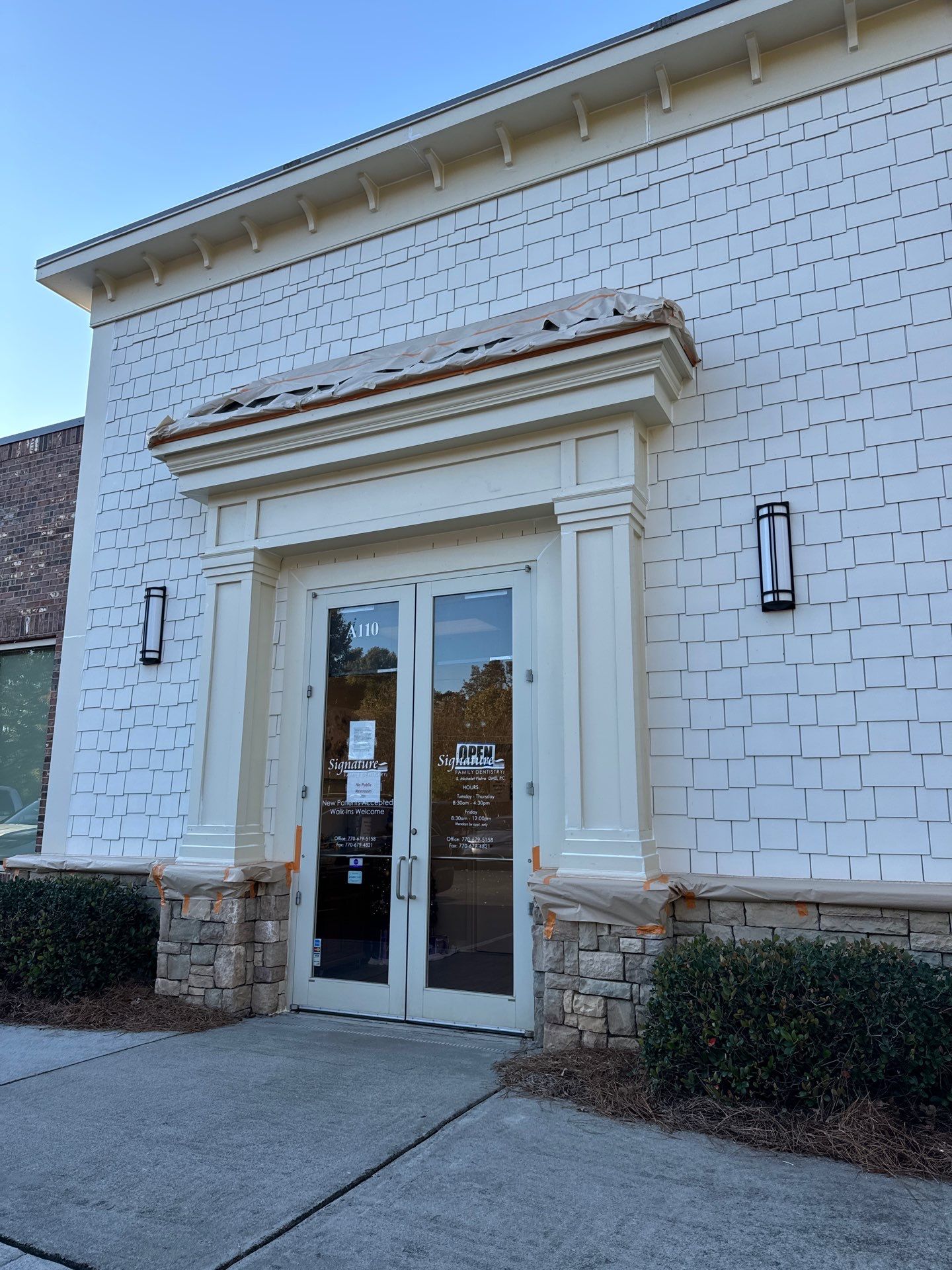 Commercial Exterior & Stairwell Painting – Corner Market by Praise God Painting, LLC