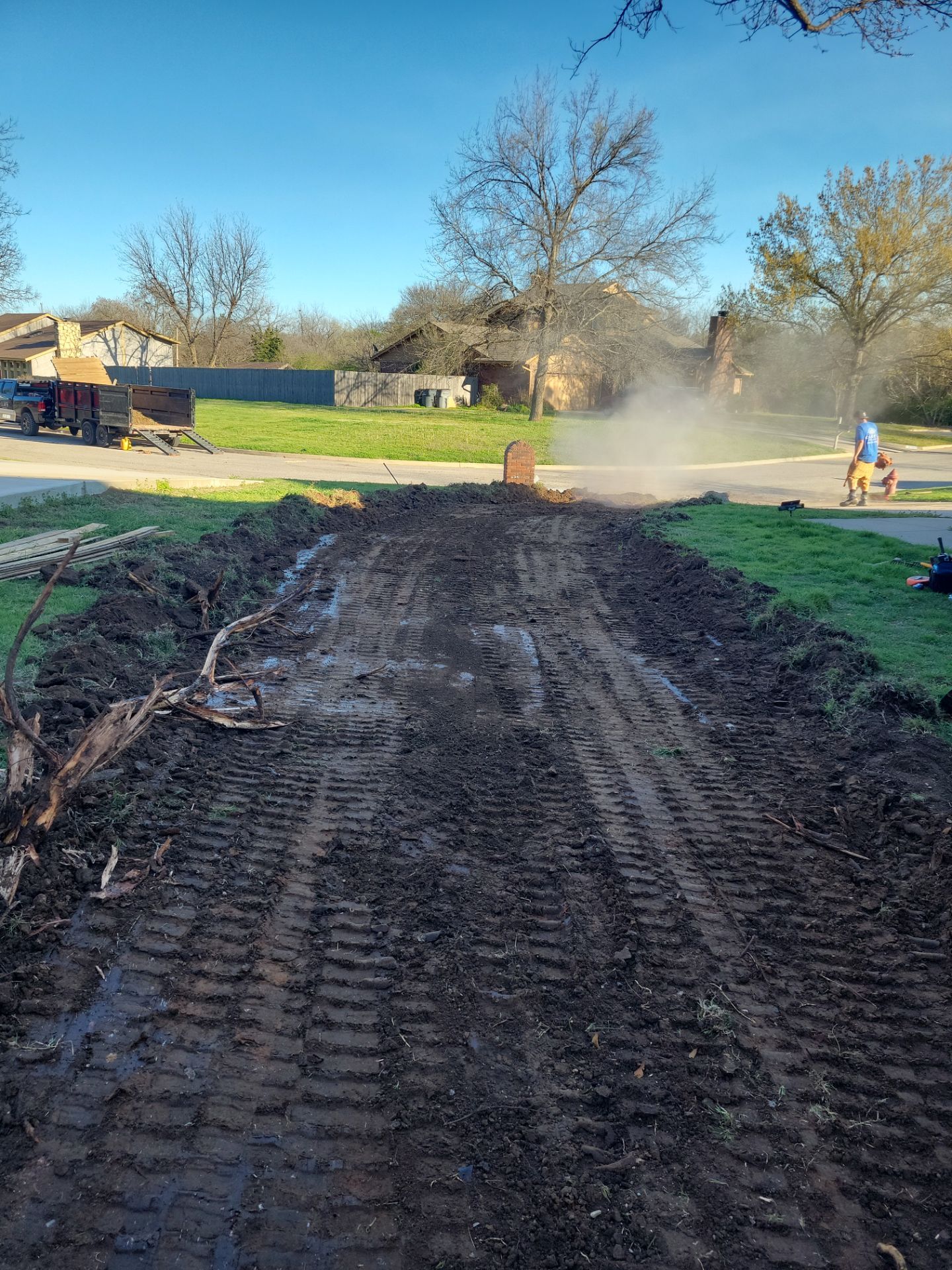 Concrete Driveway and Fence by Clays Services Inc