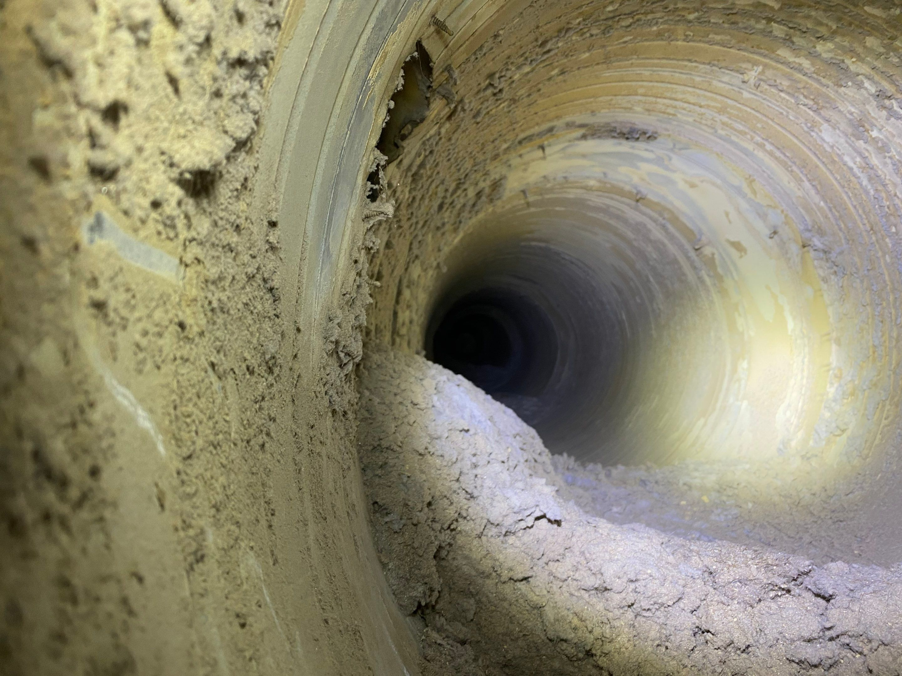 Laundromat Dryer Vent Deep Cleaning using Gas Powered Vac by Peach State Dryer Vents & Air Ducts