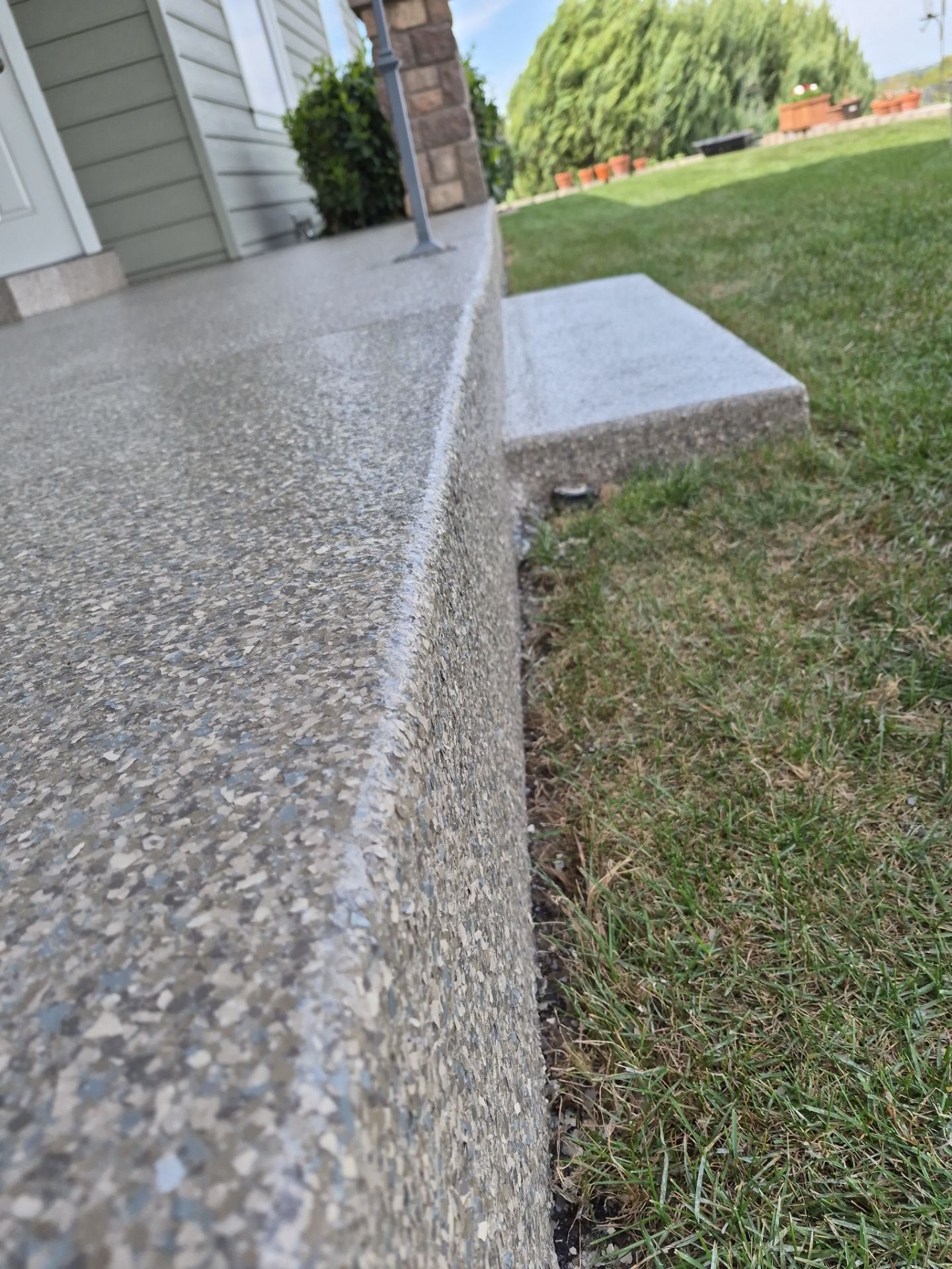 Richland Patio and Entryway Coating with Trail Mix Flake Finish by Croc Coatings, LLC