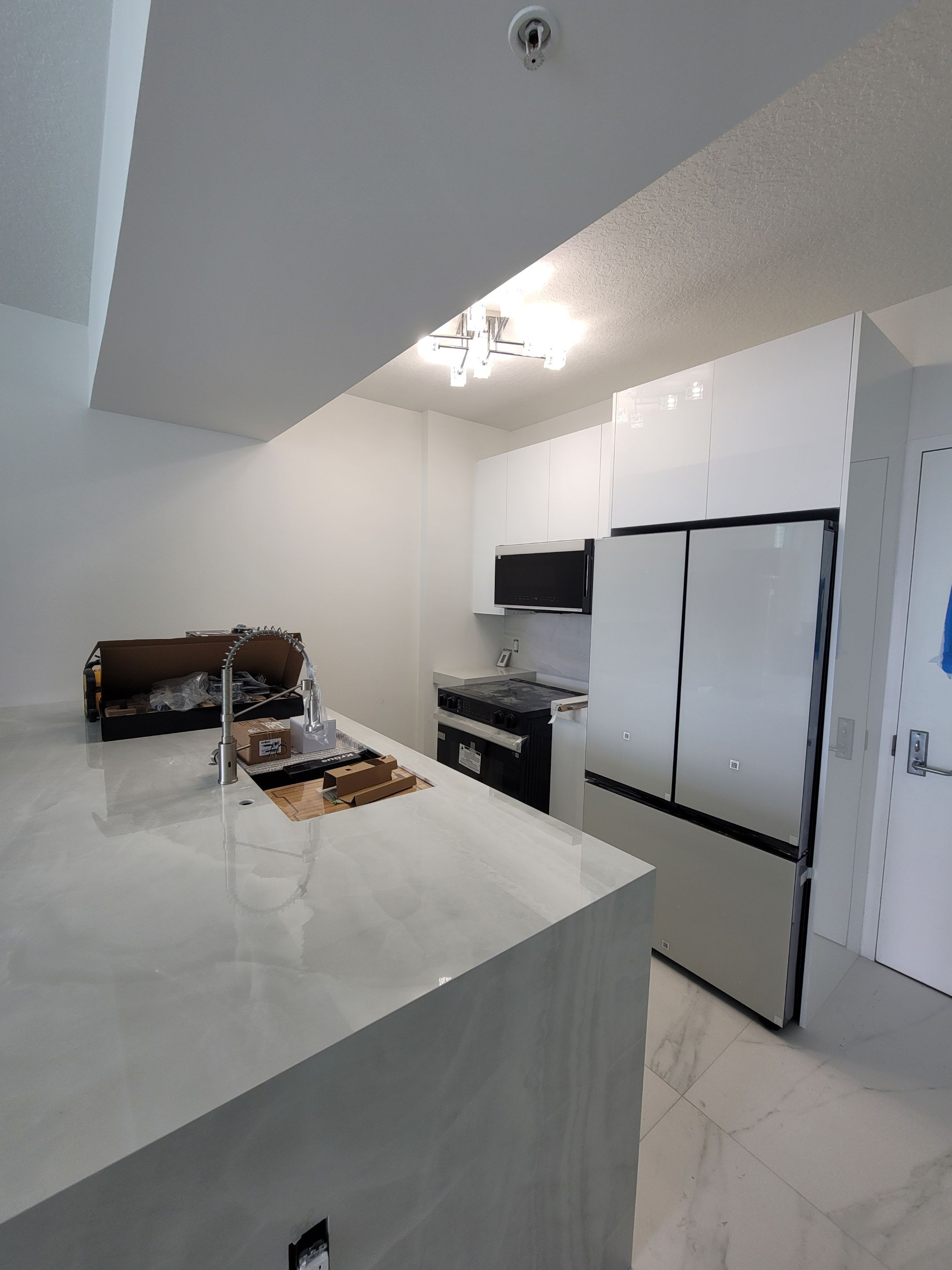Modern High-Rise Interior Renovation and Custom Tile Installation in Miami by Picos Construction Engineering
