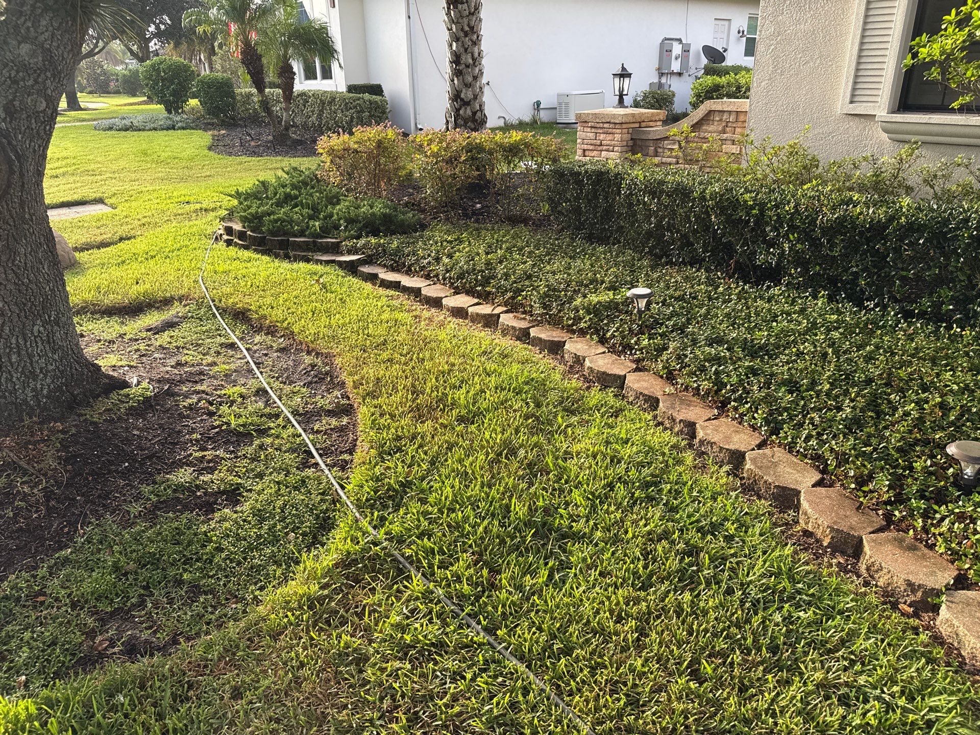 Tile Roof, Paver Pool Deck & Flowerbed Curbing Cleaning | Winding River Bradenton, FL Transformation by Sunshine AquaWash