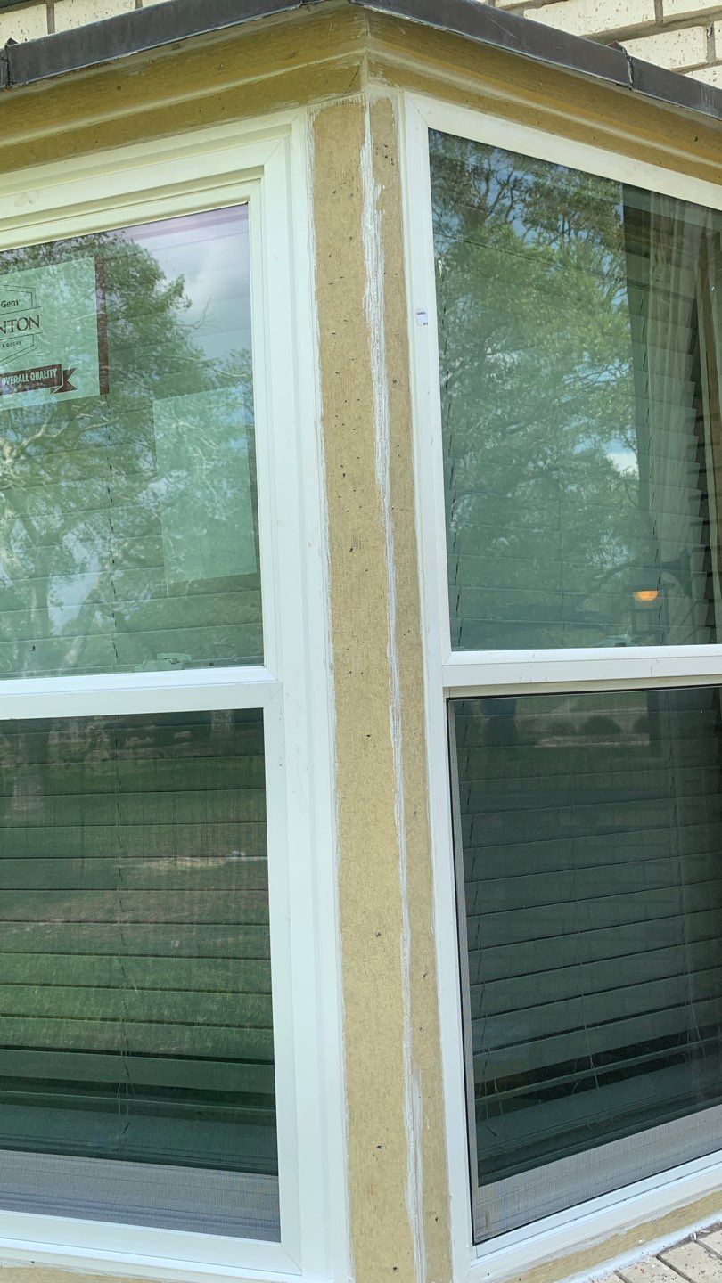 Mansard Charm by Bayfront Roofing and Construction