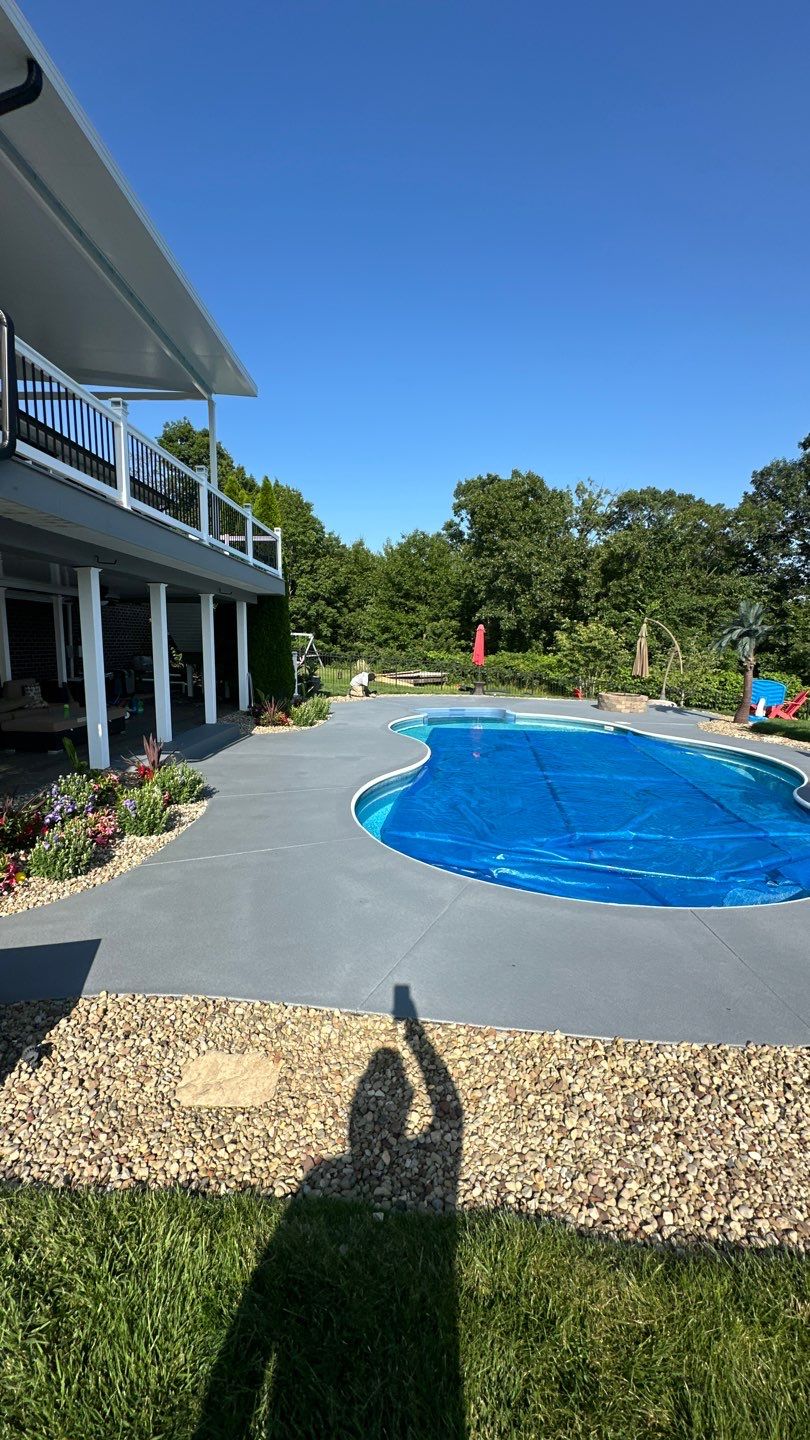 Twilight Pool Deck / Patio Project in Beaver falls by Floors in a Day, Inc