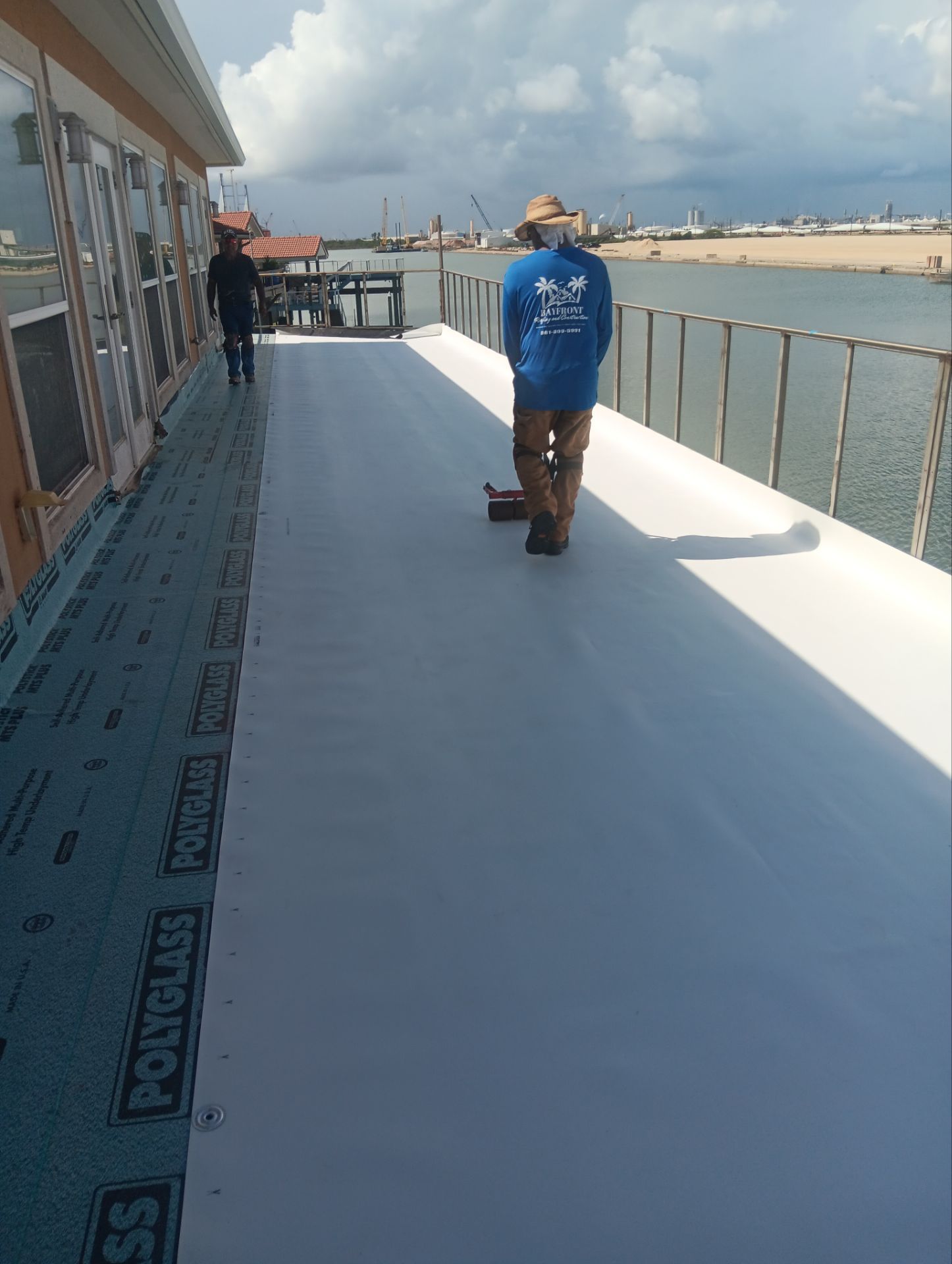 Walk Out Patio Cover by Bayfront Roofing and Construction