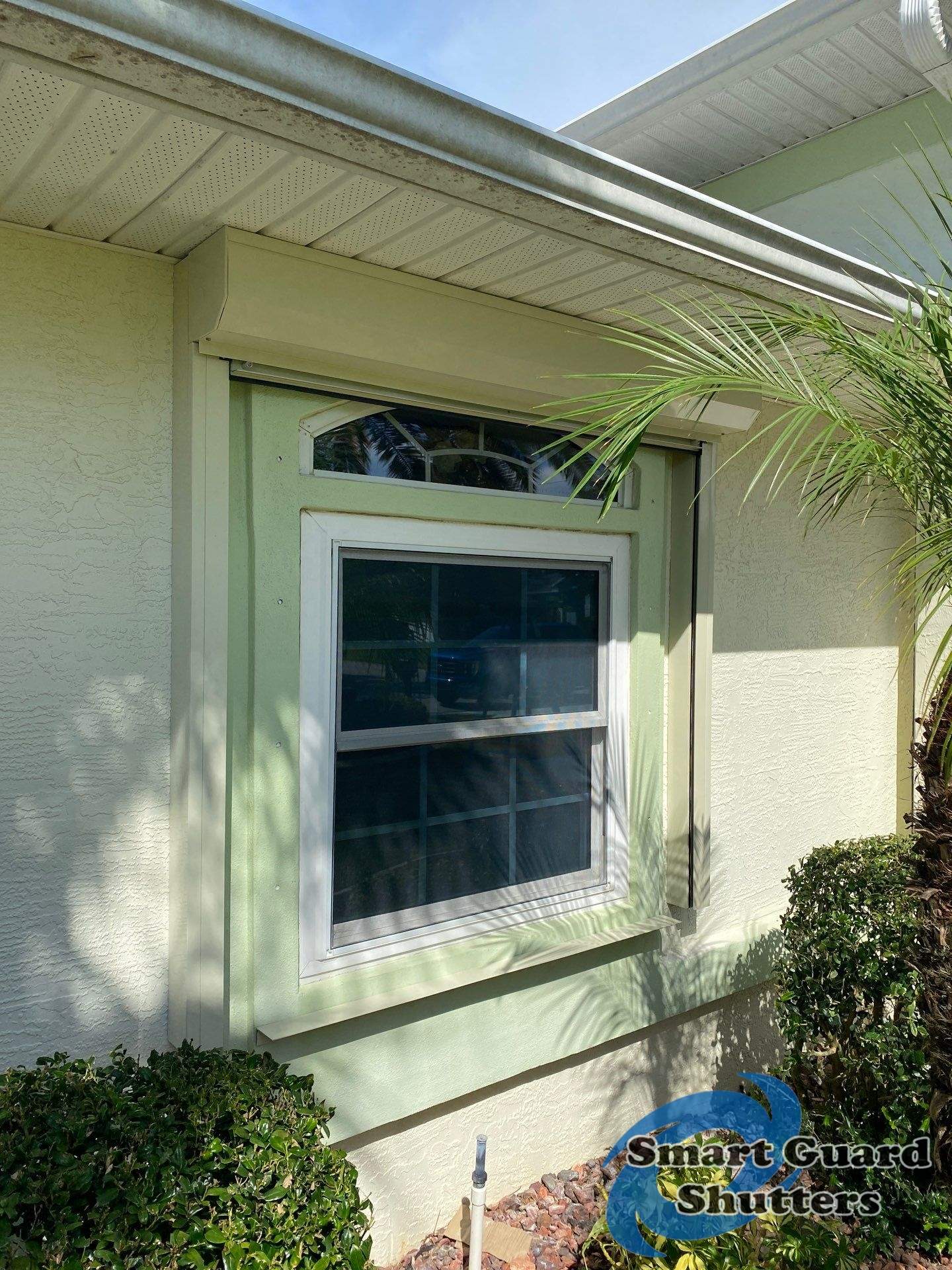 Rolling Shutters in Ivory by Smart Guard Shutters