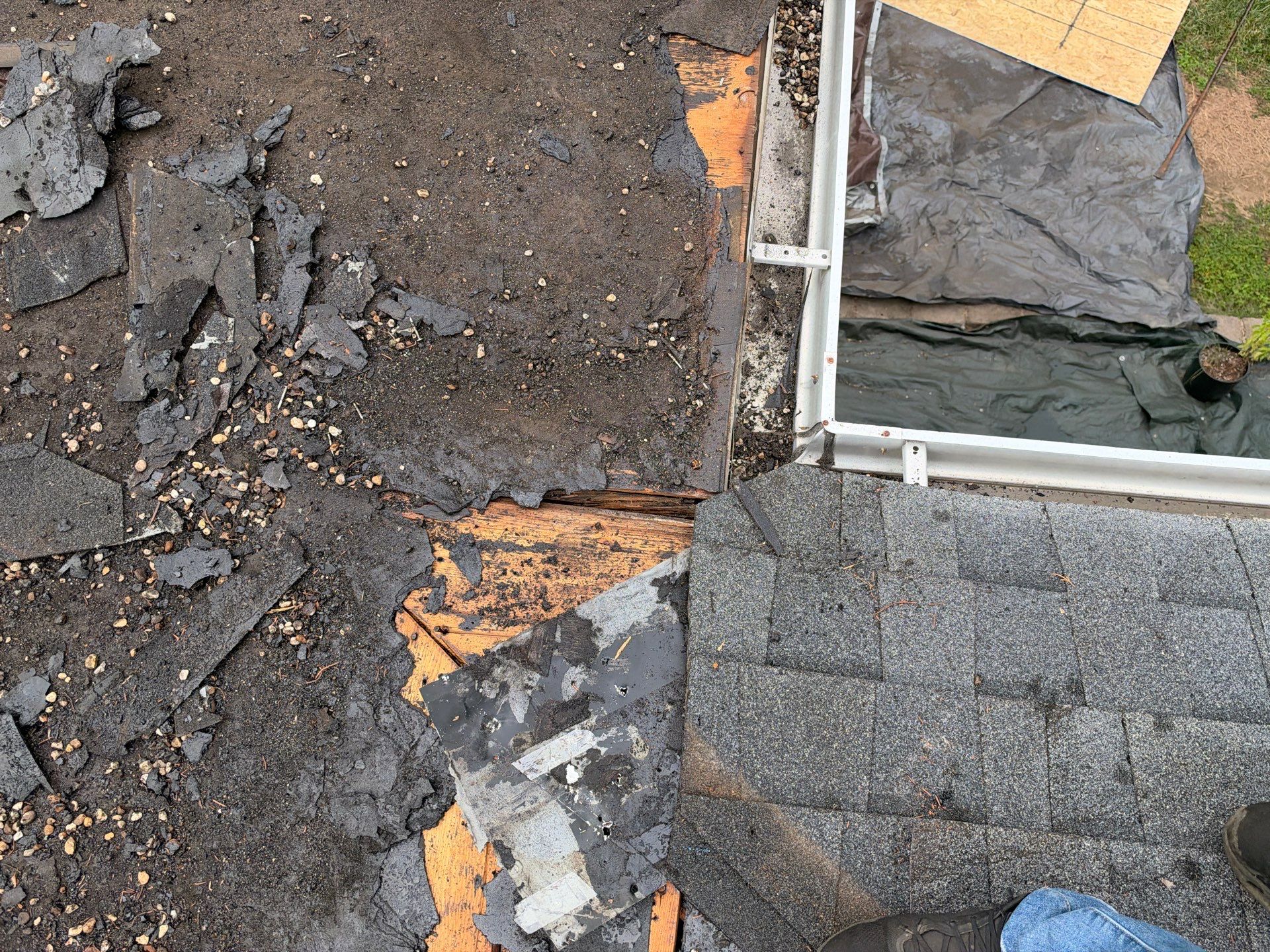 Richmond Roof Replacement Including Flat Membrane and Asphalt Shingles by Cade Construction