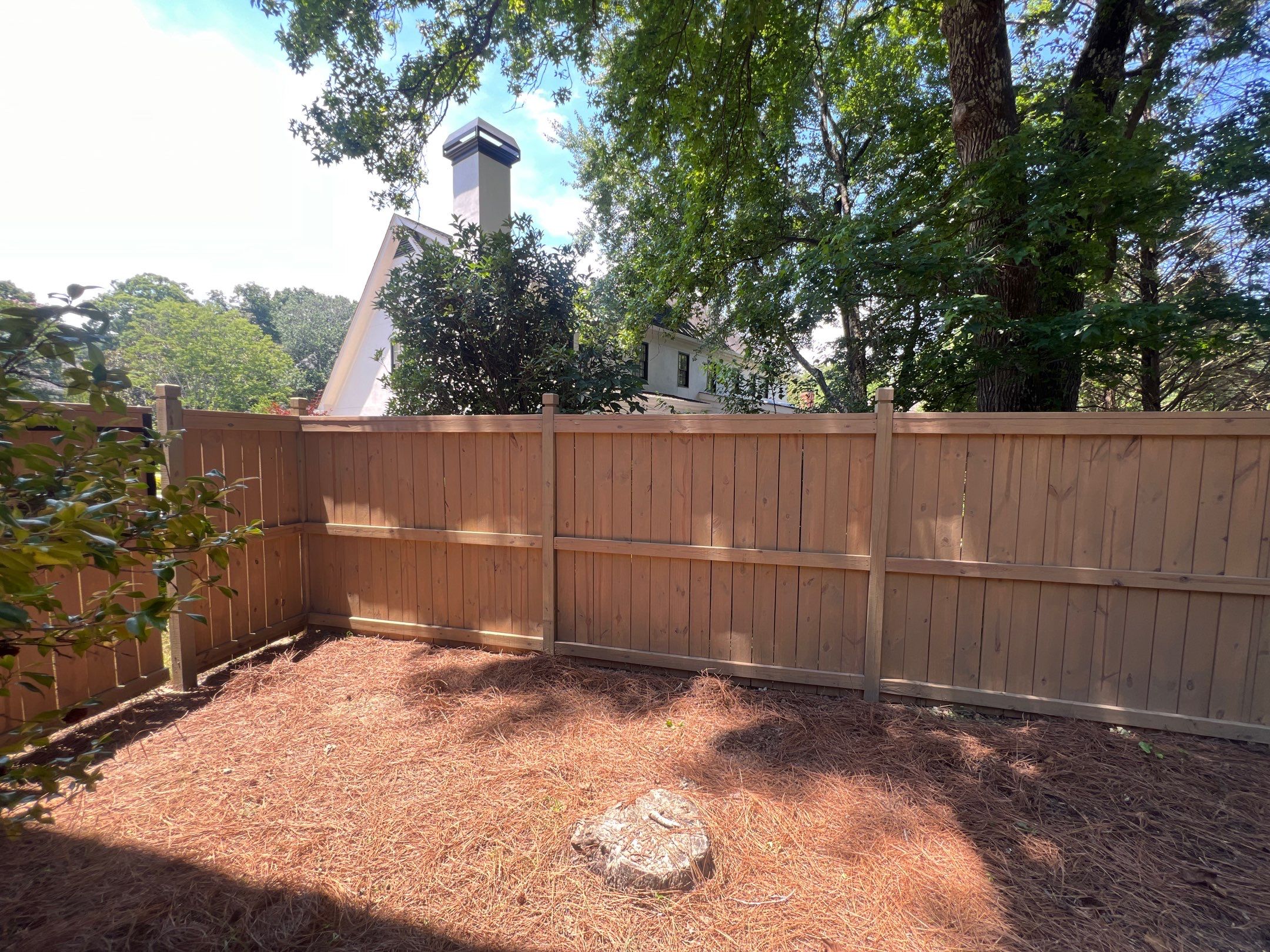 Pressure-Treated Wood Fence Installation and Deck Staining in Atlanta by Swift Home Renovations