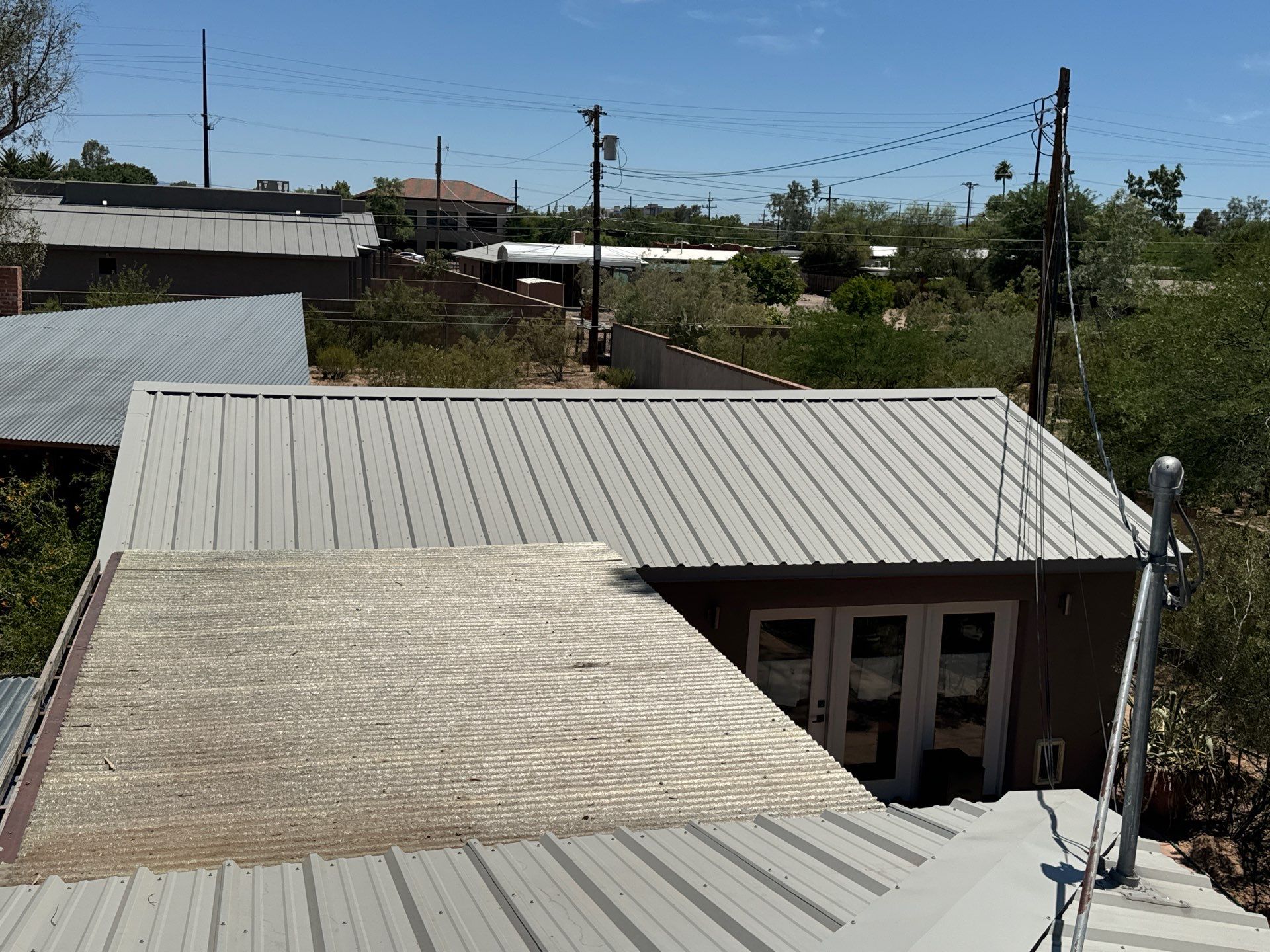 Light Stone Exposed Fastener by Reimagine Roofing