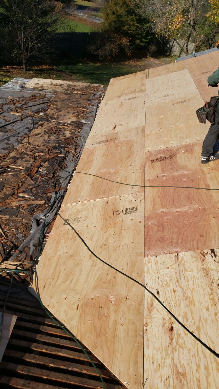 Asphalt Roof Replacement by Custom Installations