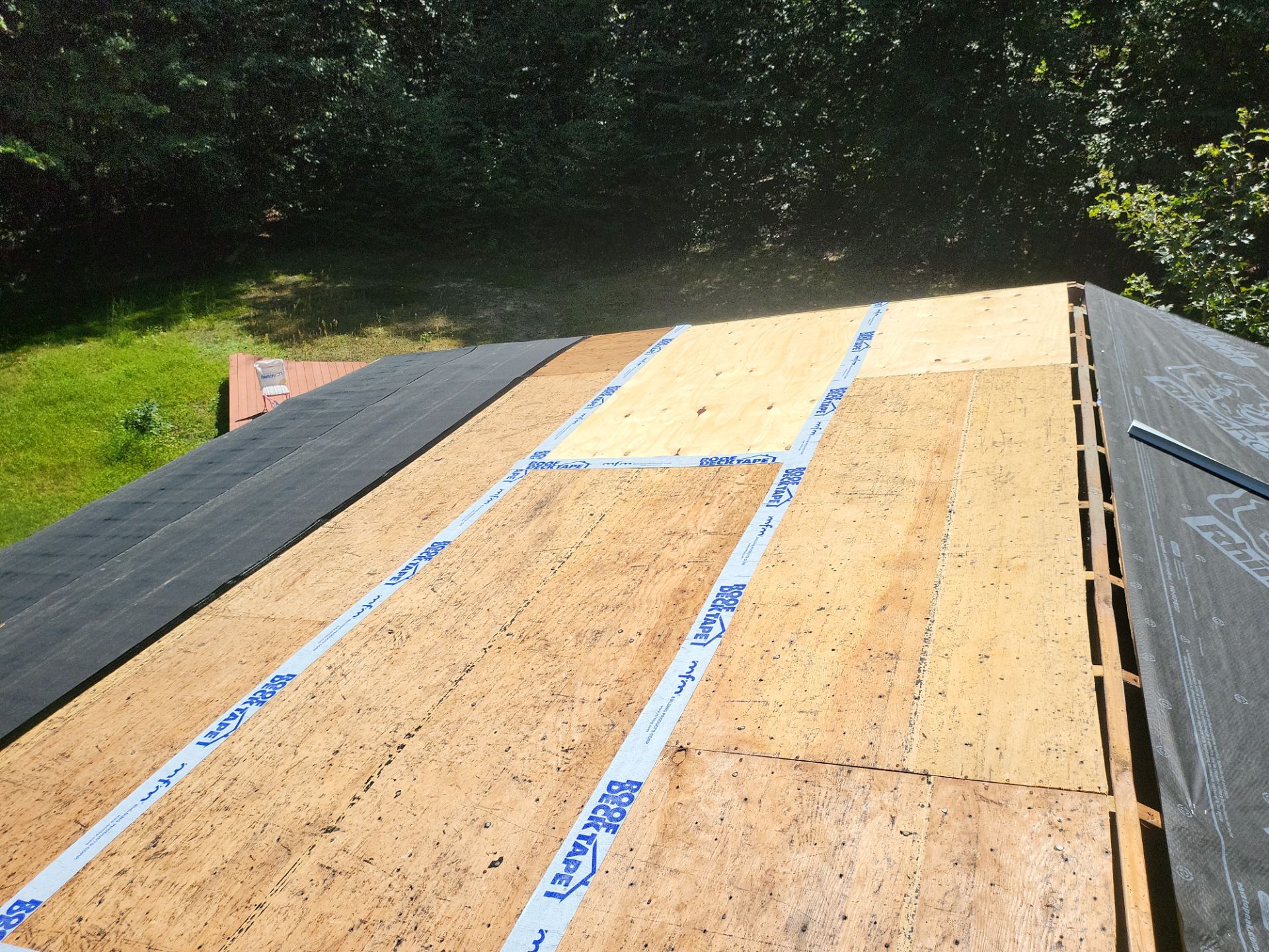 Commercial Roofing Installation using Owens Corning TruDefinition Duration AR - Harbor Blue by A Plus Exterior