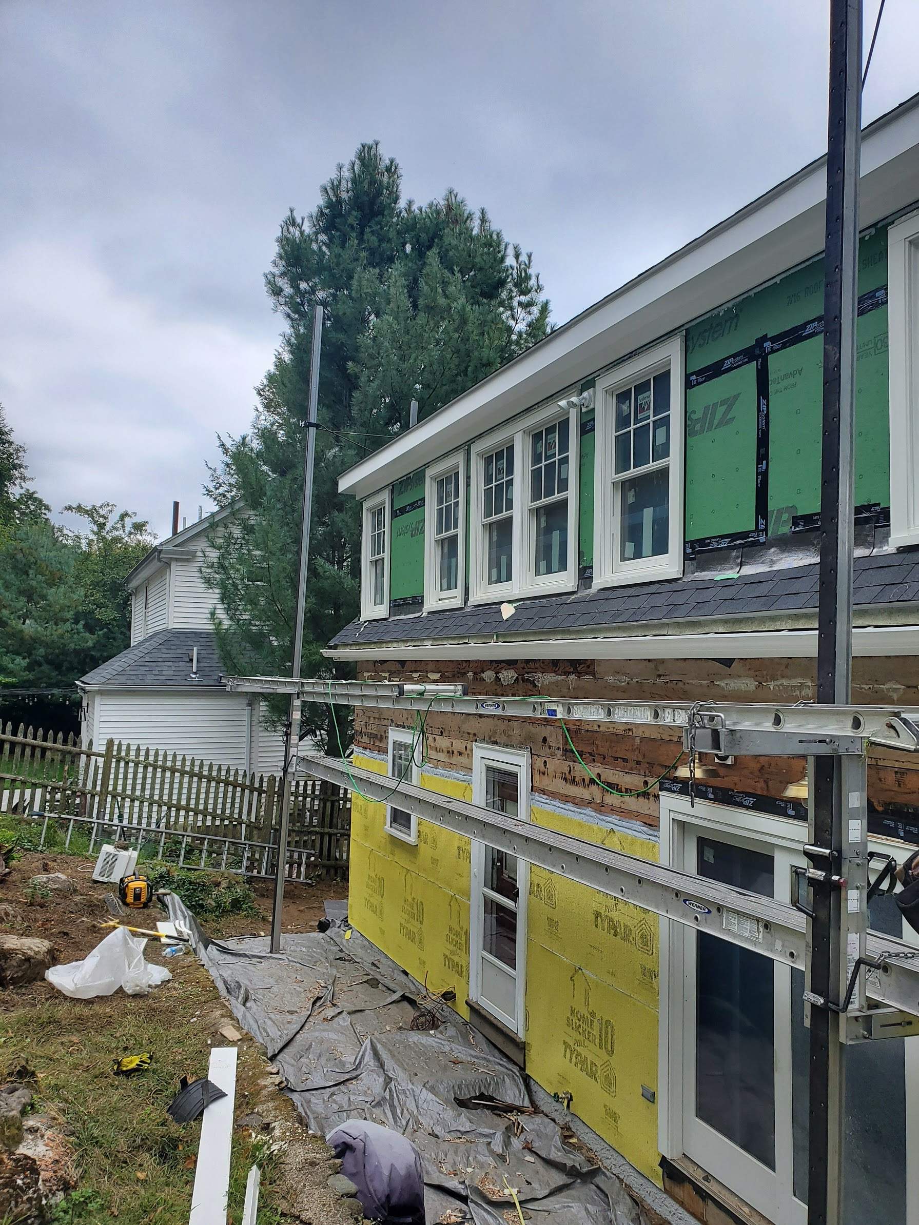 Siding Installation using Red Cedar by UBrothers Construction