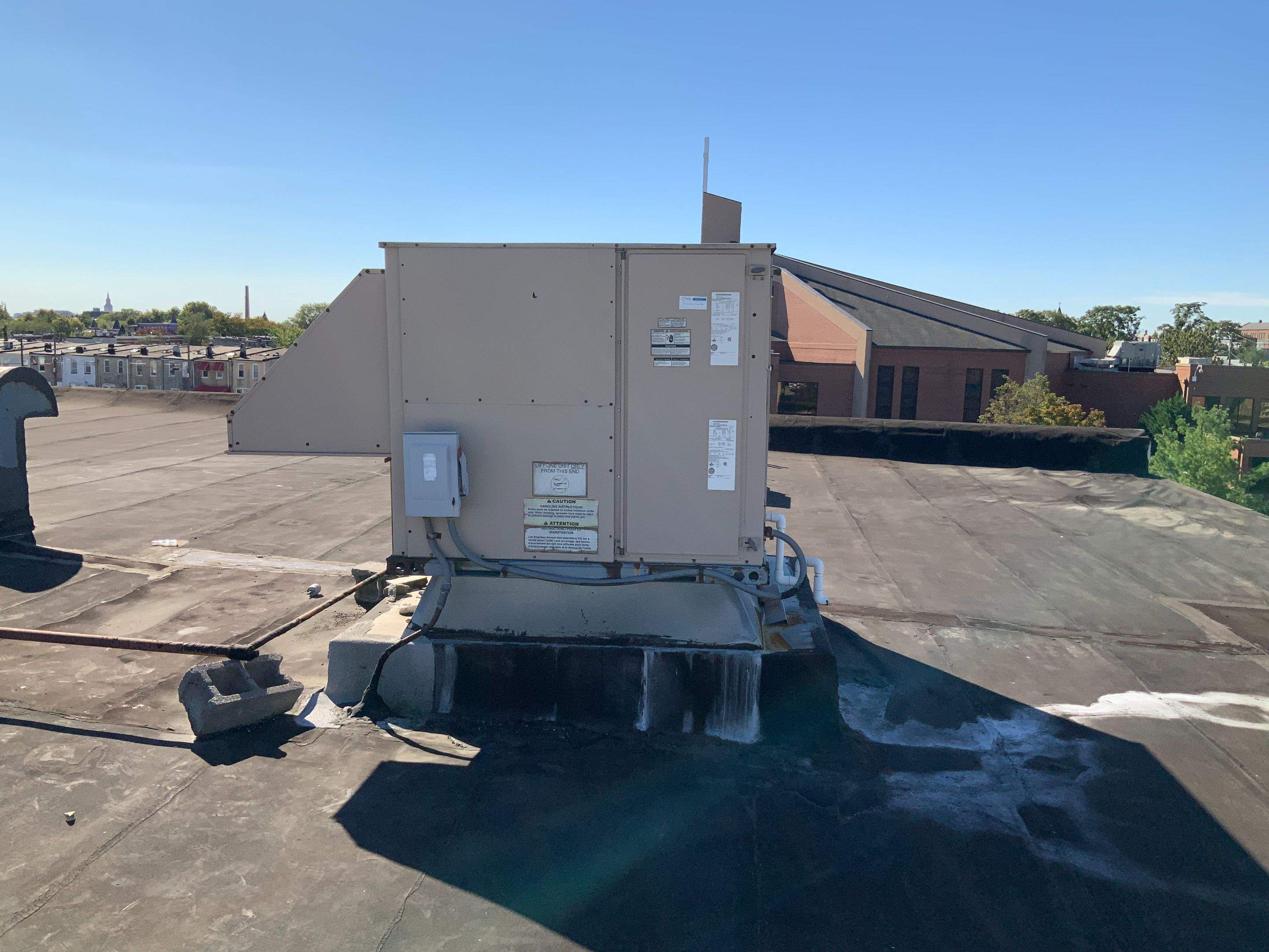 Commercial Roofing Repair using new Flashing by Alpha Design Services