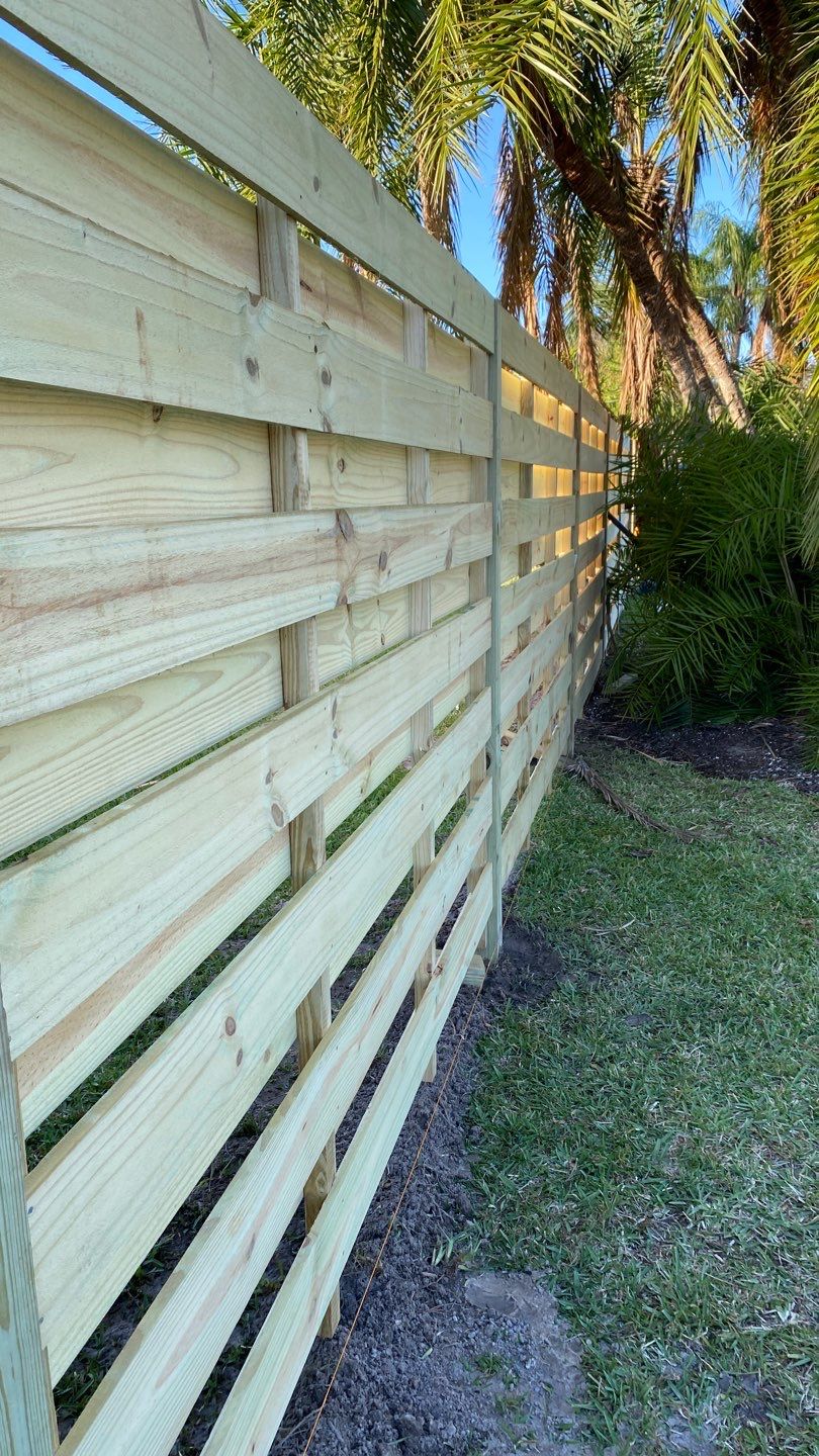 Wood Fence Installation using Shadowbox Wood Fence by Asap fence and gates, LLC