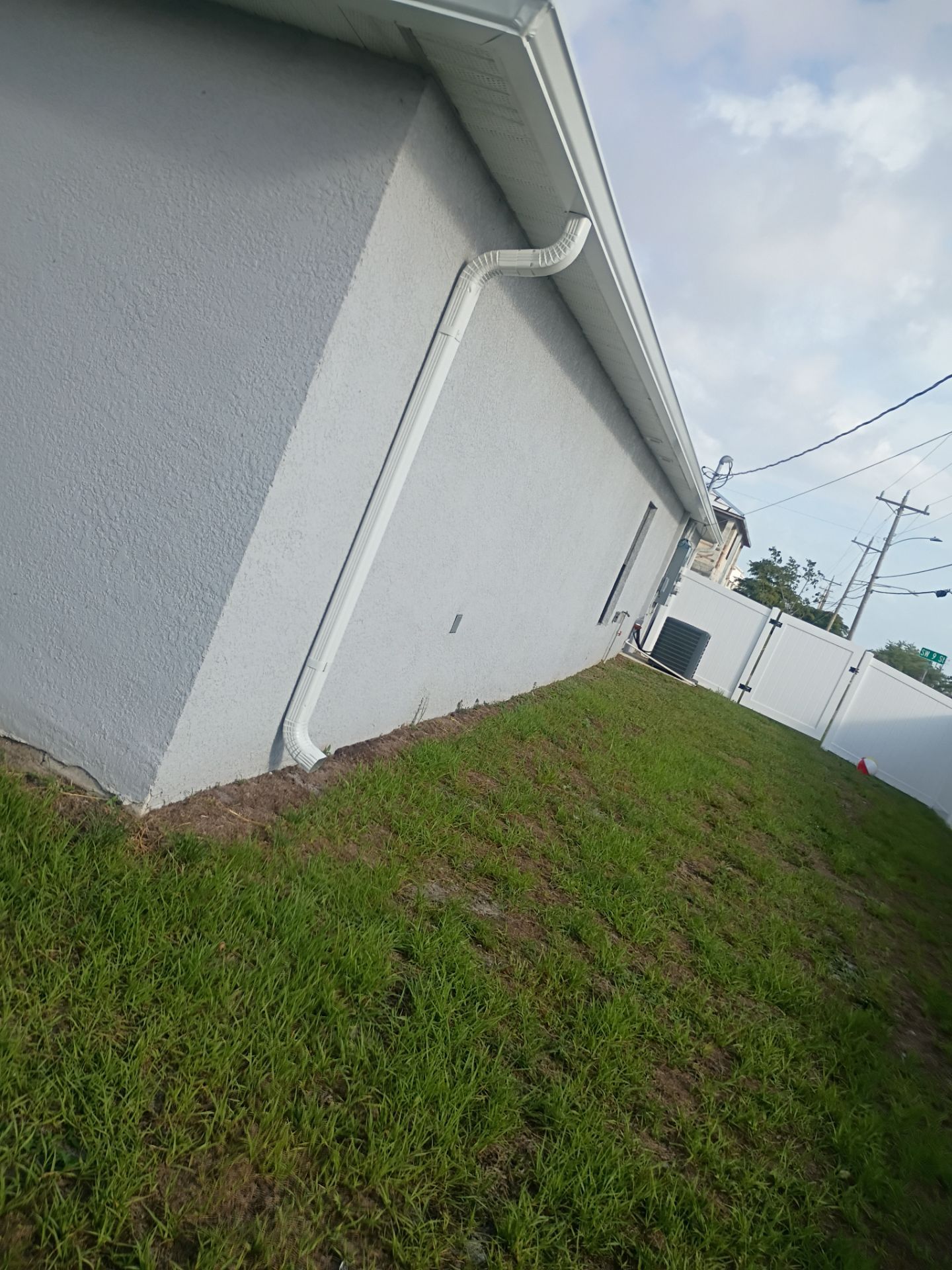 Seamless Aluminum Gutter Installation using K-Style Seamless Gutters in Cape Coral FL by Gutter Professors