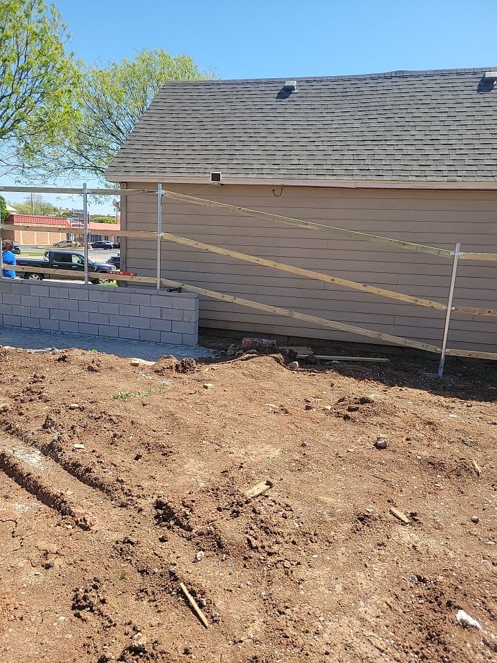 Cedar Fence using Cedar Pickets and Metal Poles by Clays Services Inc