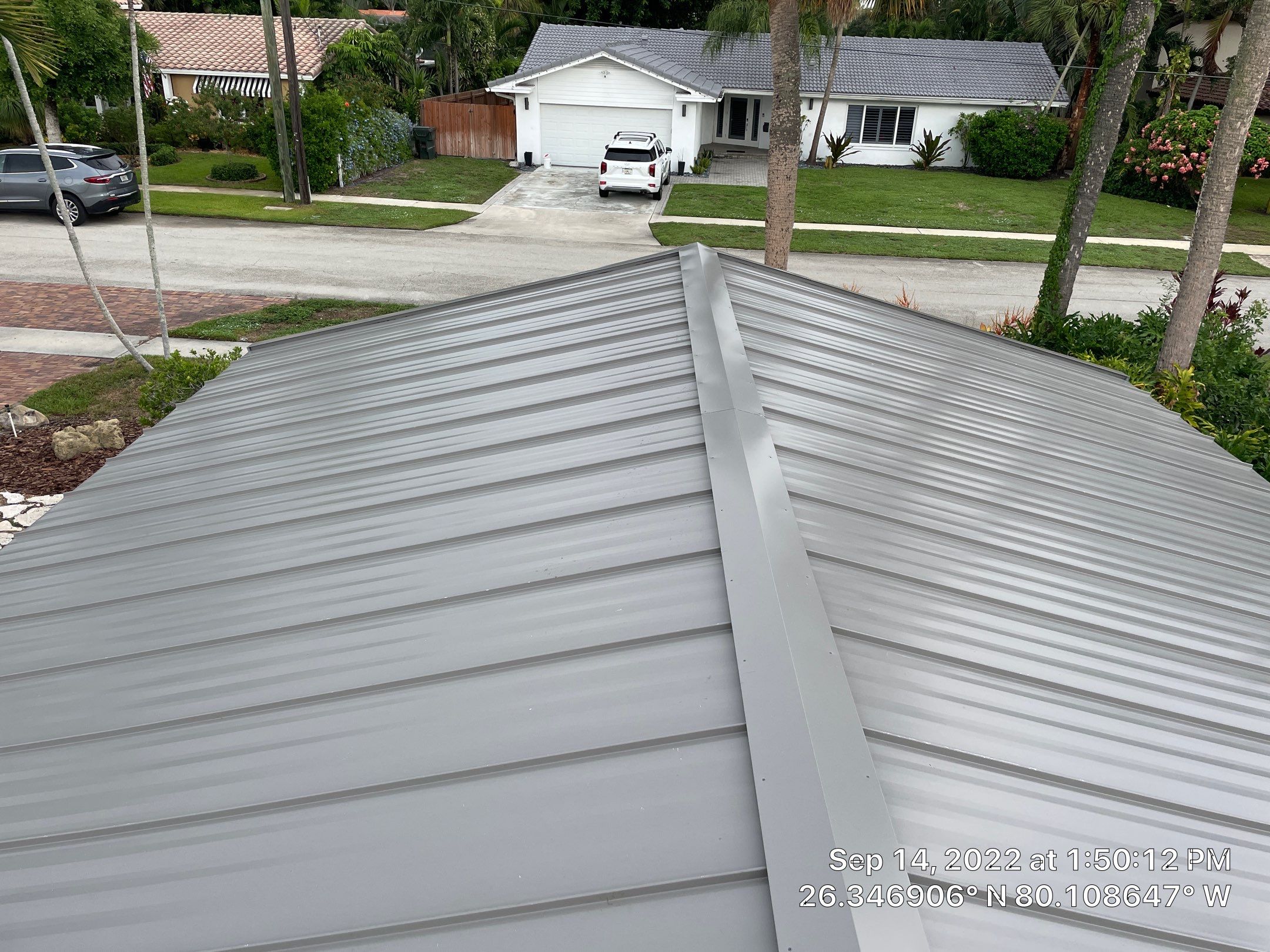 Residential Roofing Installation using 1" Nail strip metal roof by BLUES BROTHERS CONSTRUCTION CORP