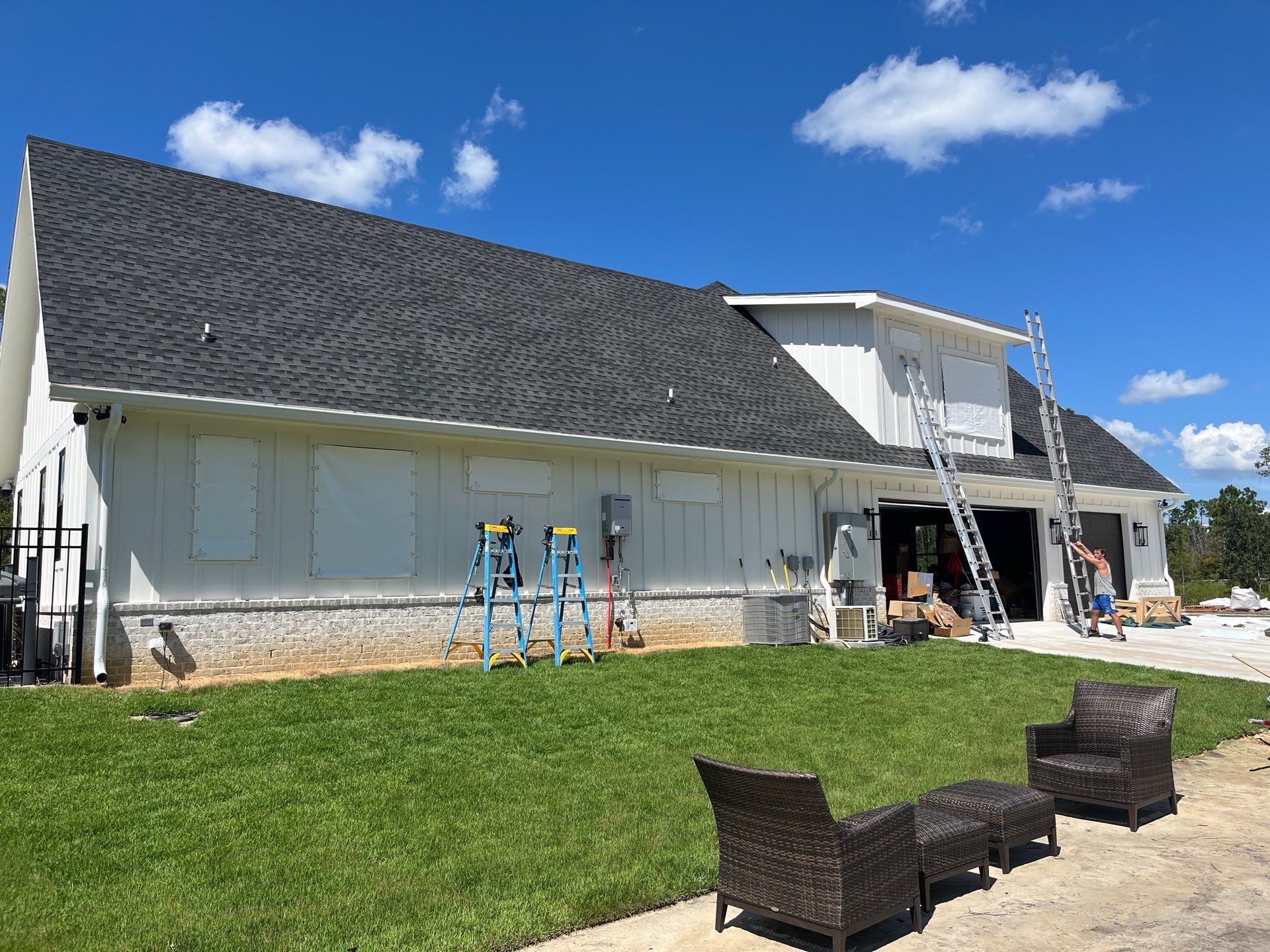 Custom Hurricane Fabric Storm Shutter Installation in Panama City by Brannan Aluminum Inc.